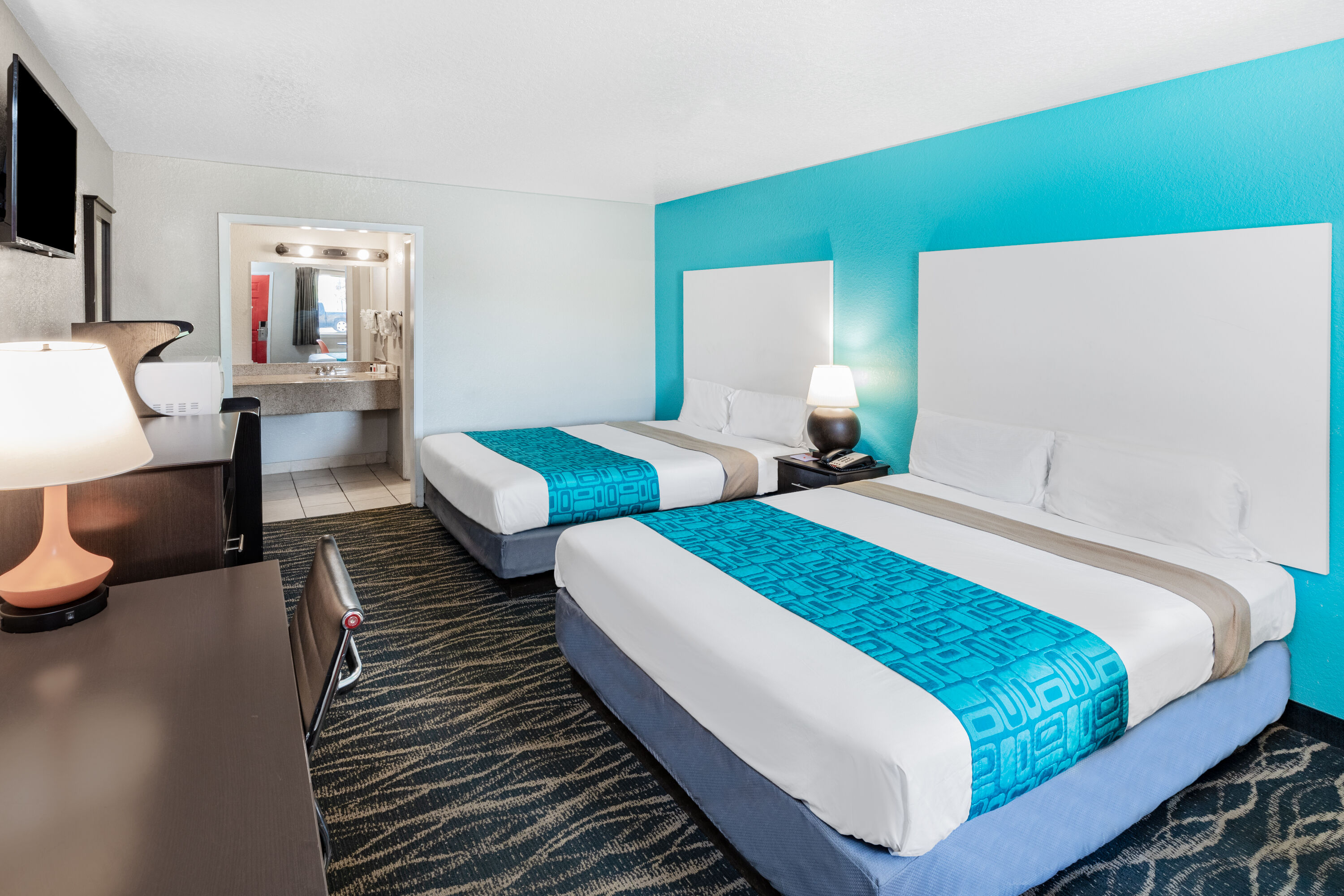 Guest room at the Howard Johnson by Wyndham Houston Hobby Airport in Houston, Texas