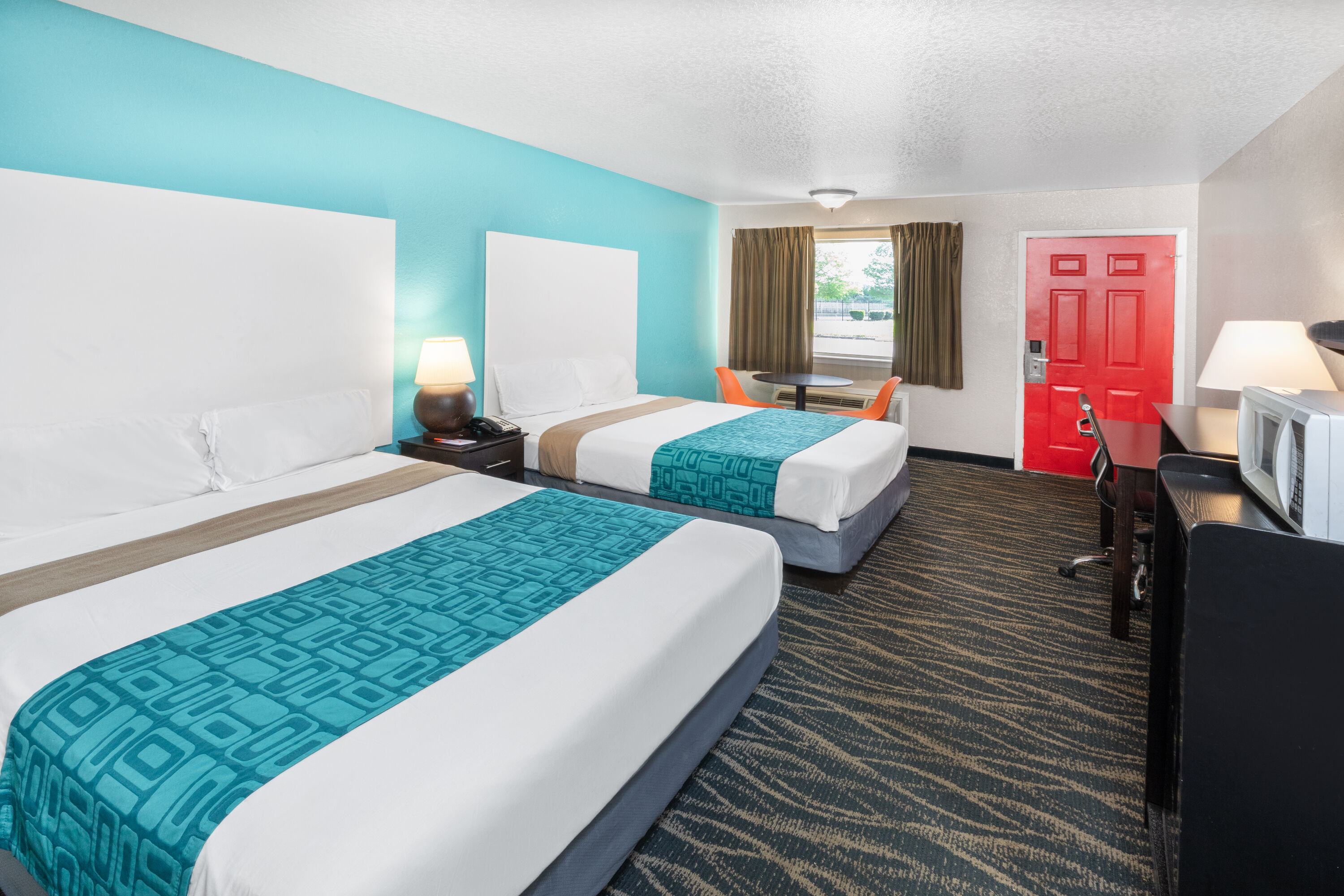 Guest room at the Howard Johnson by Wyndham Houston Hobby Airport in Houston, Texas