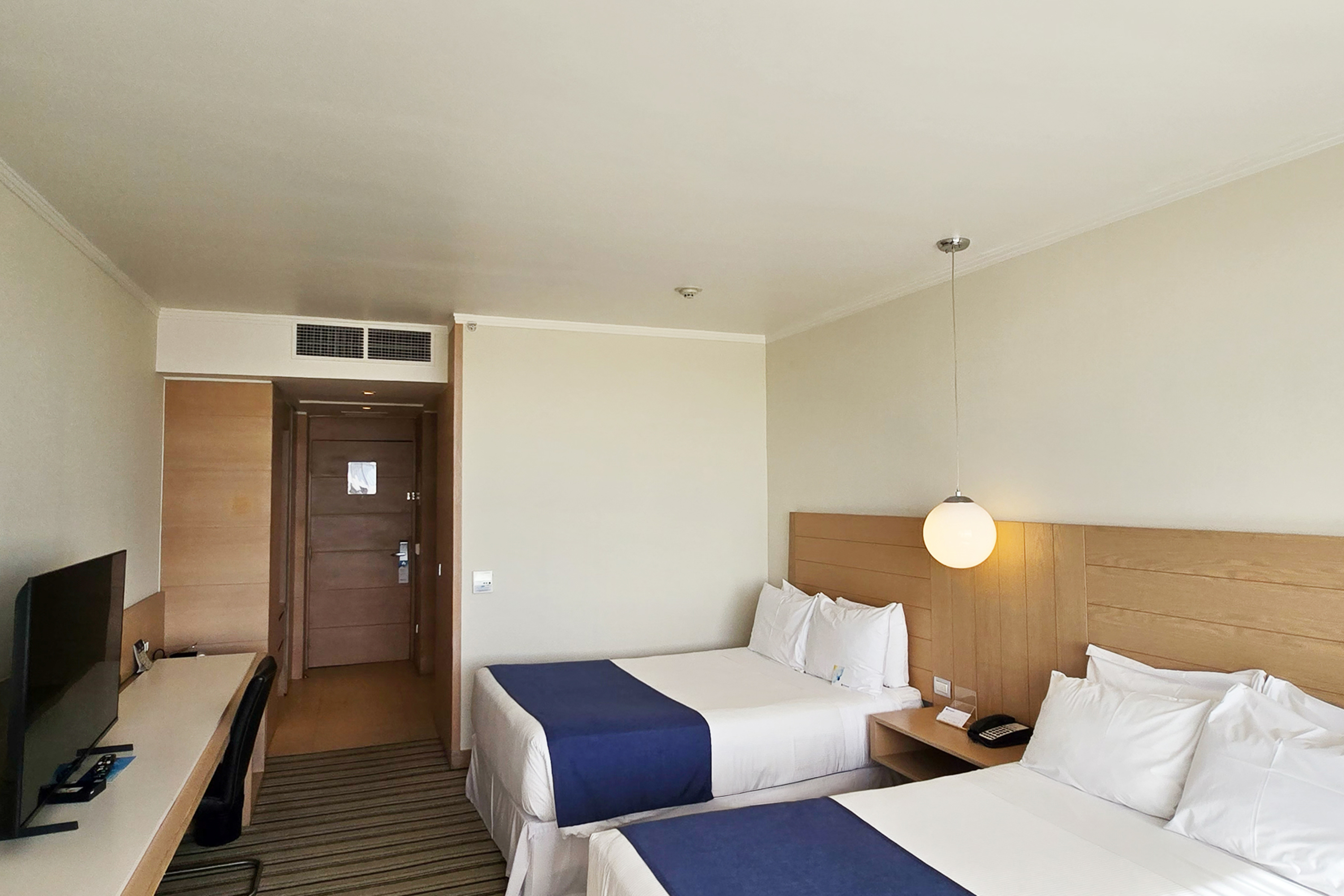 Guest room at the Wyndham Concepcion Pettra in Concepcion, Other than US/Canada