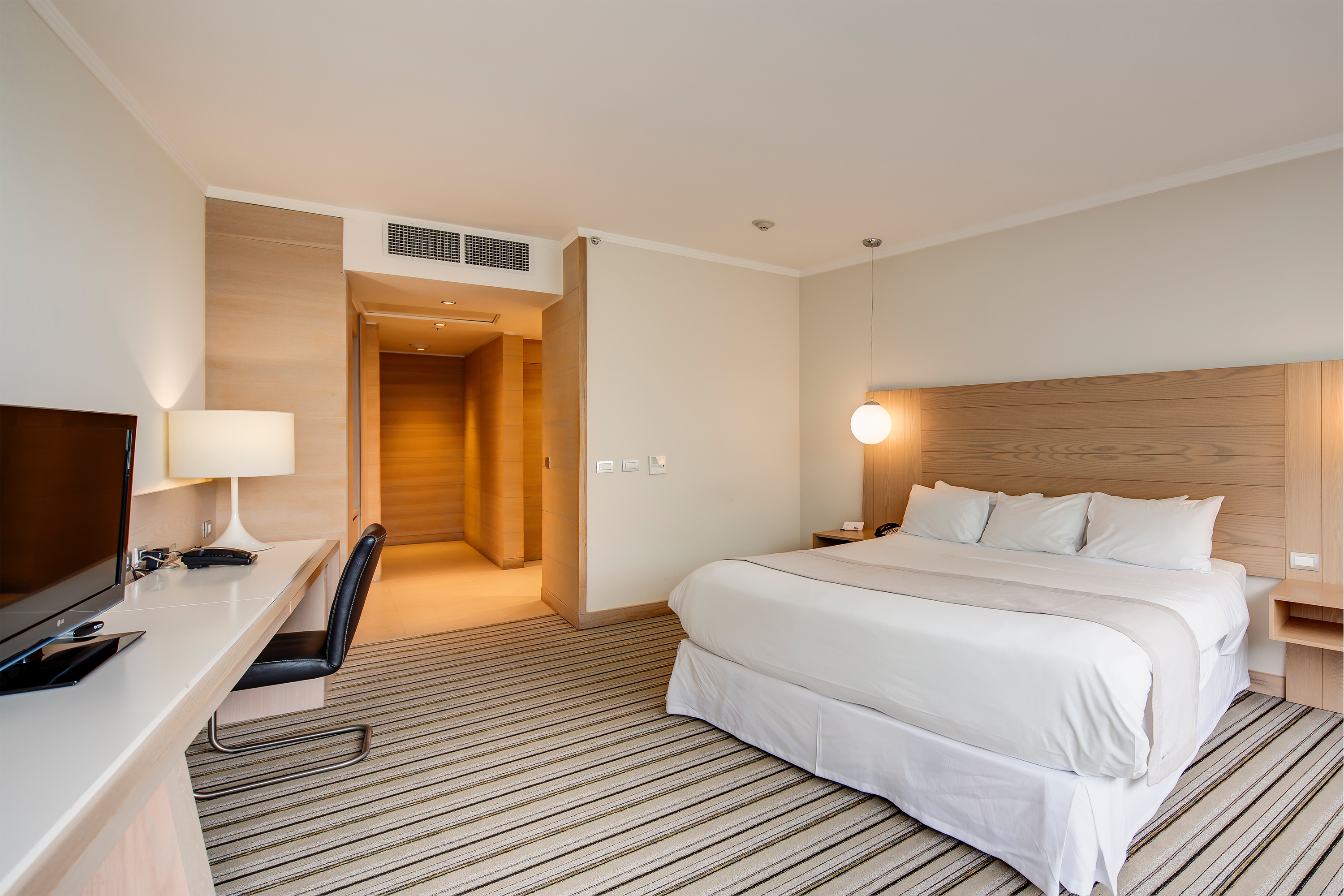 Guest room at the Wyndham Concepcion Pettra in Concepcion, Other than US/Canada