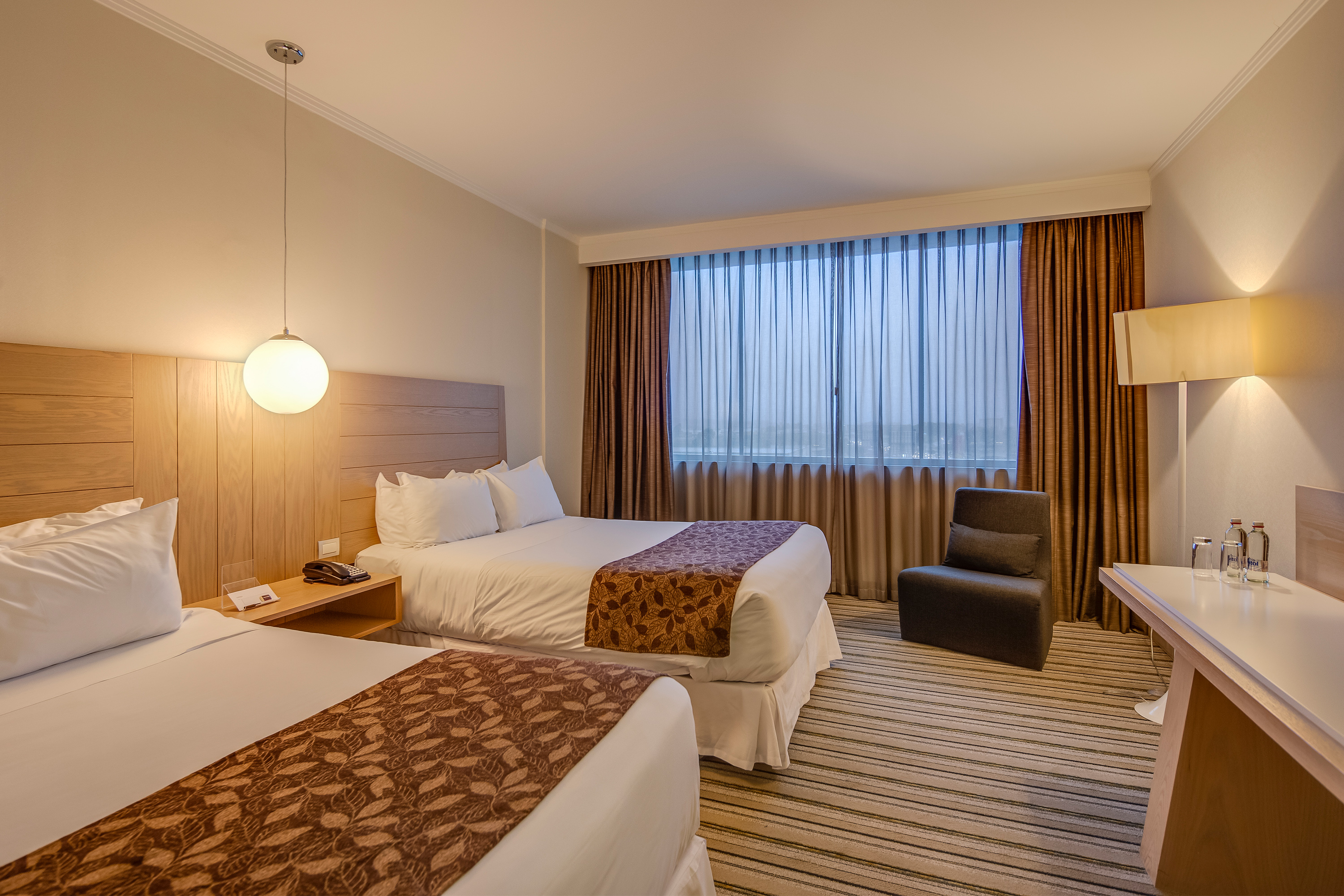 Guest room at the Wyndham Concepcion Pettra in Concepcion, Other than US/Canada