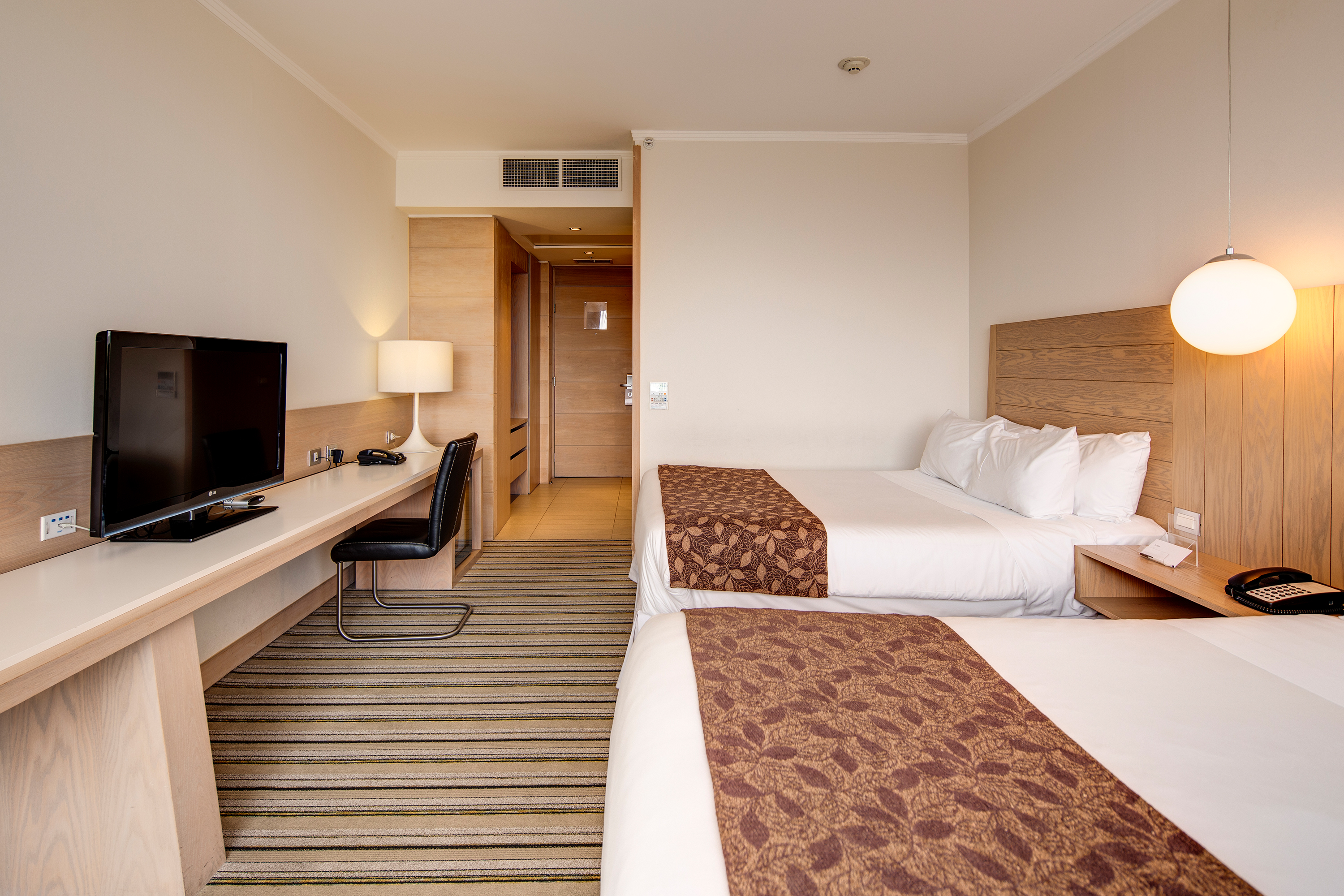 Guest room at the Wyndham Concepcion Pettra in Concepcion, Other than US/Canada