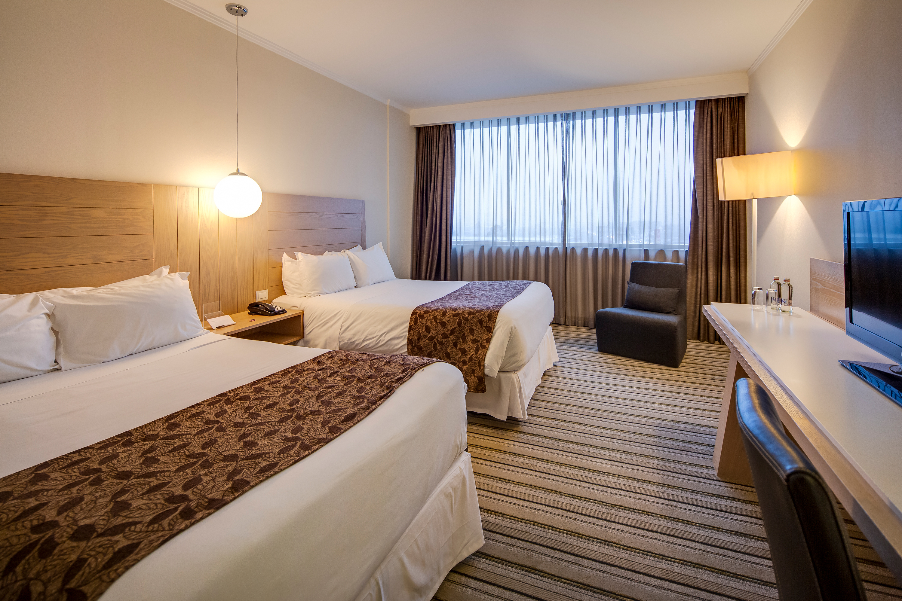 Guest room at the Wyndham Concepcion Pettra in Concepcion, Other than US/Canada