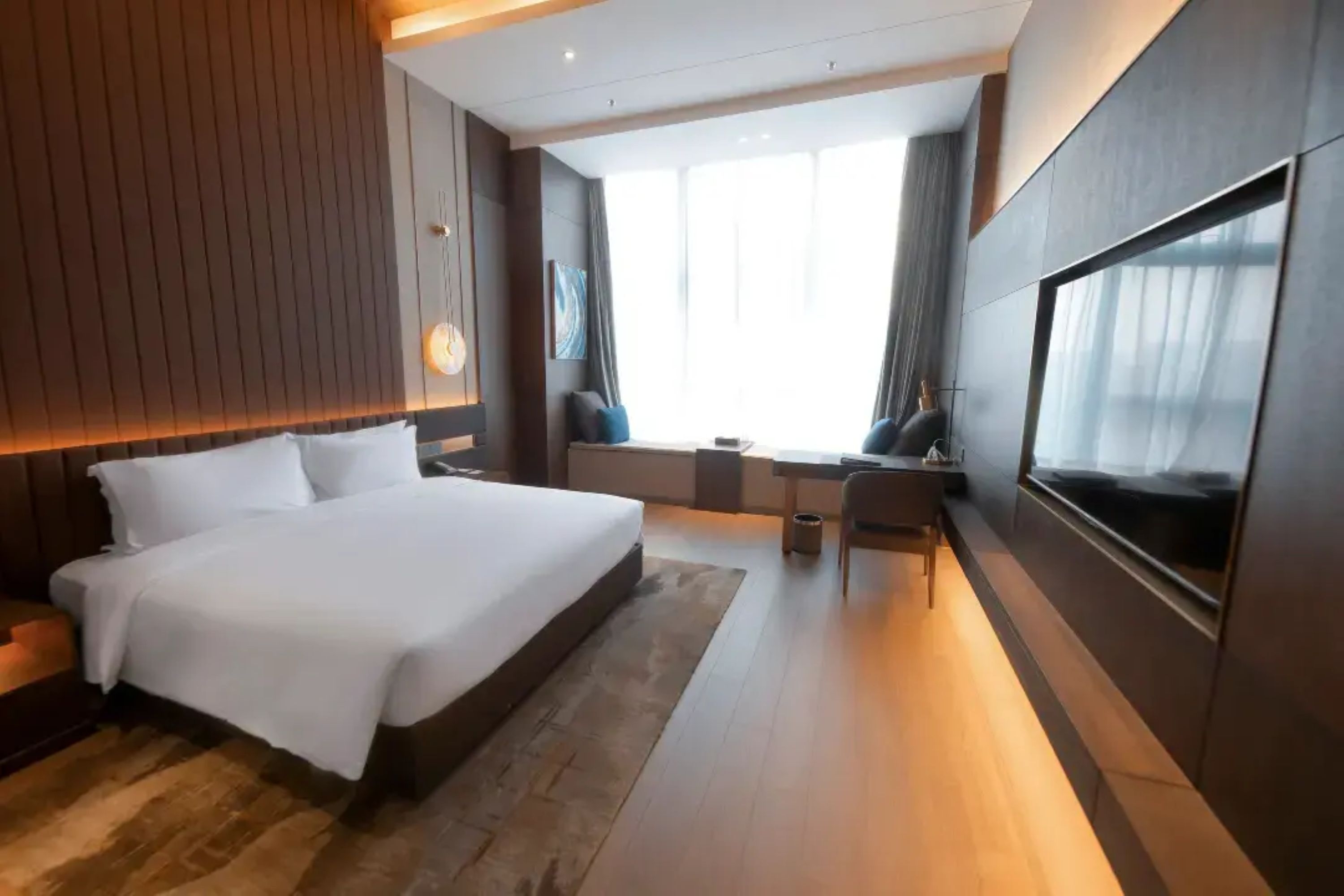 Guest room at the Wyndham Dalian Jinpu in Dalian, Other than US/Canada