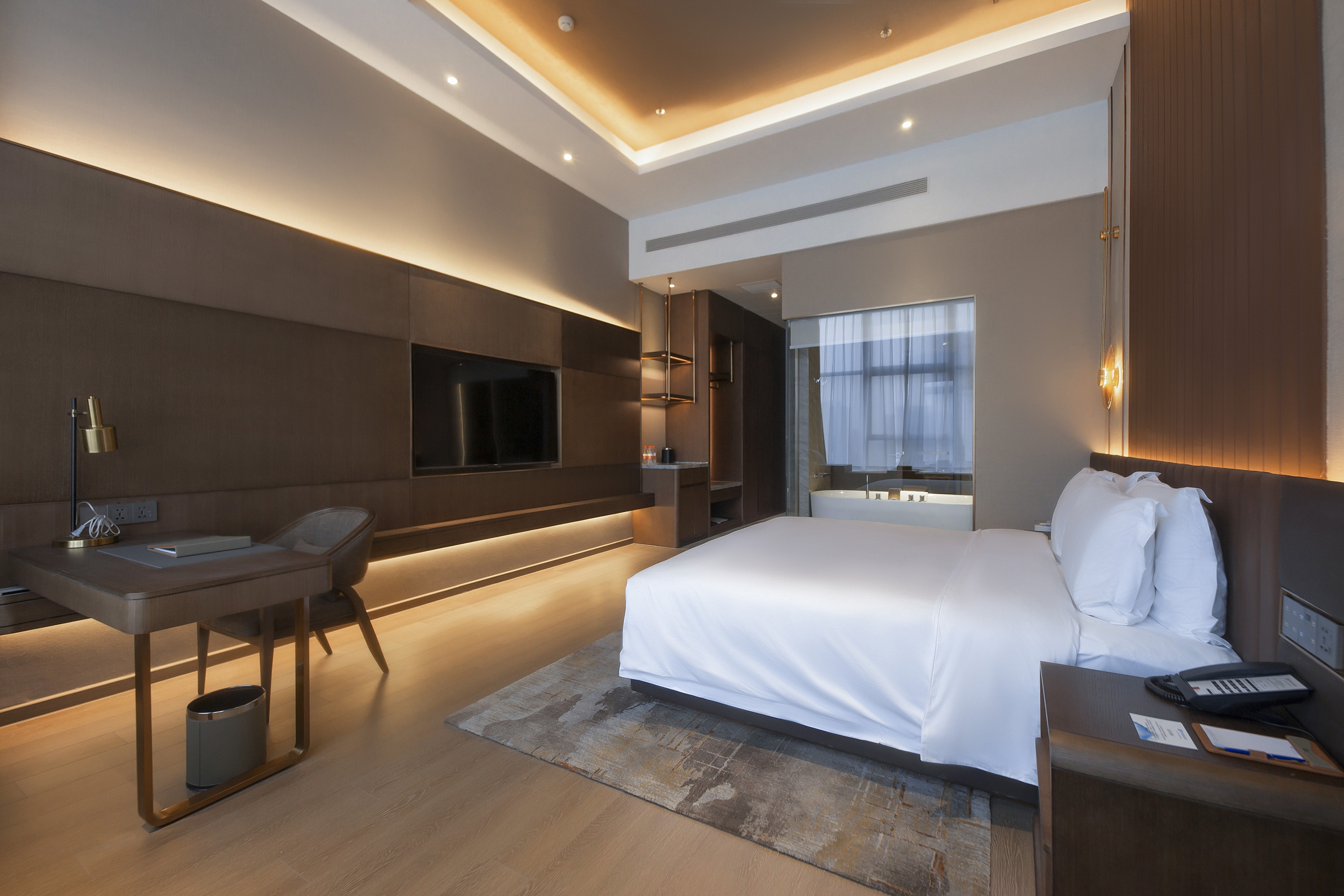 Guest room at the Wyndham Dalian Jinpu in Dalian, Other than US/Canada