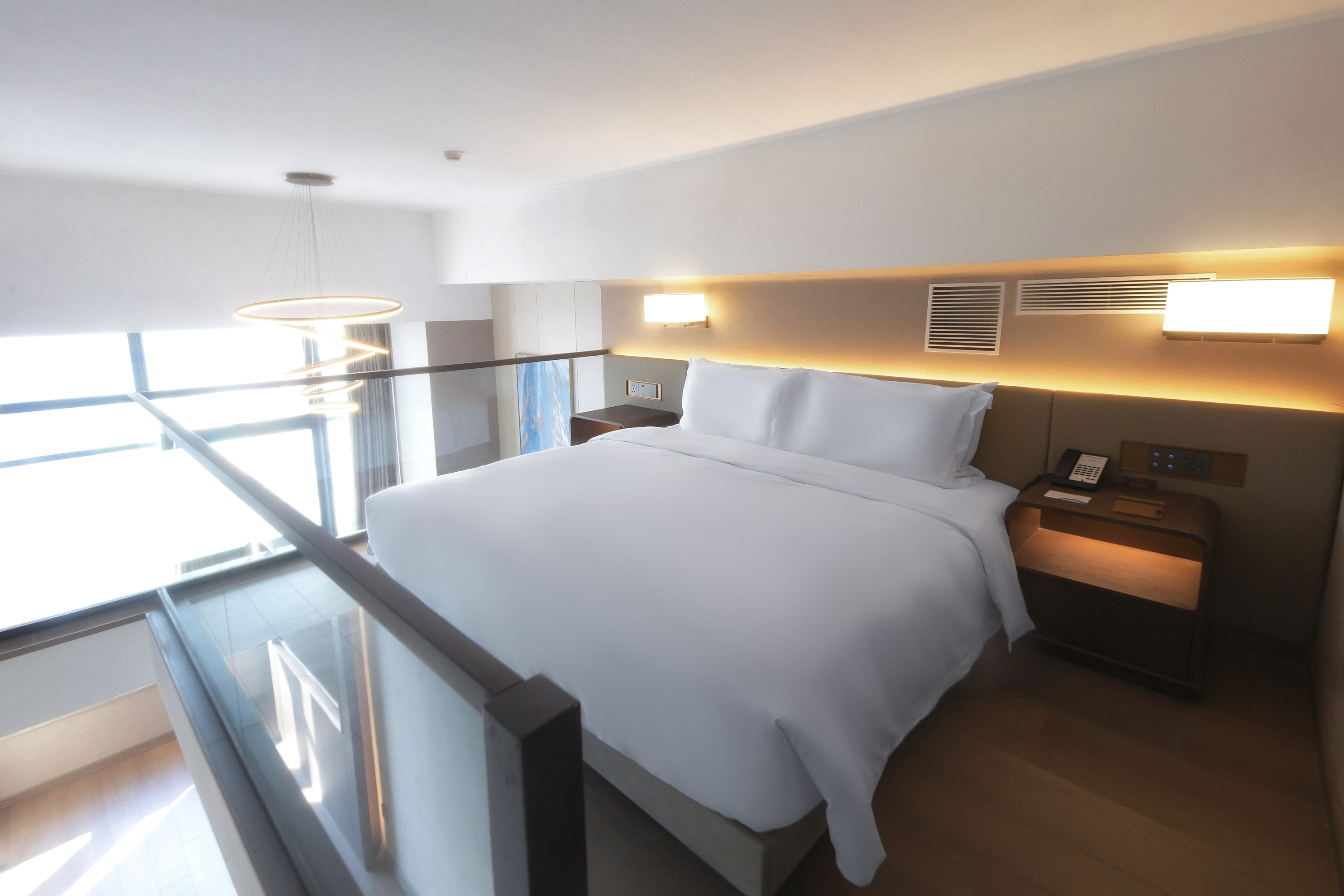 Guest room at the Wyndham Dalian Jinpu in Dalian, Other than US/Canada