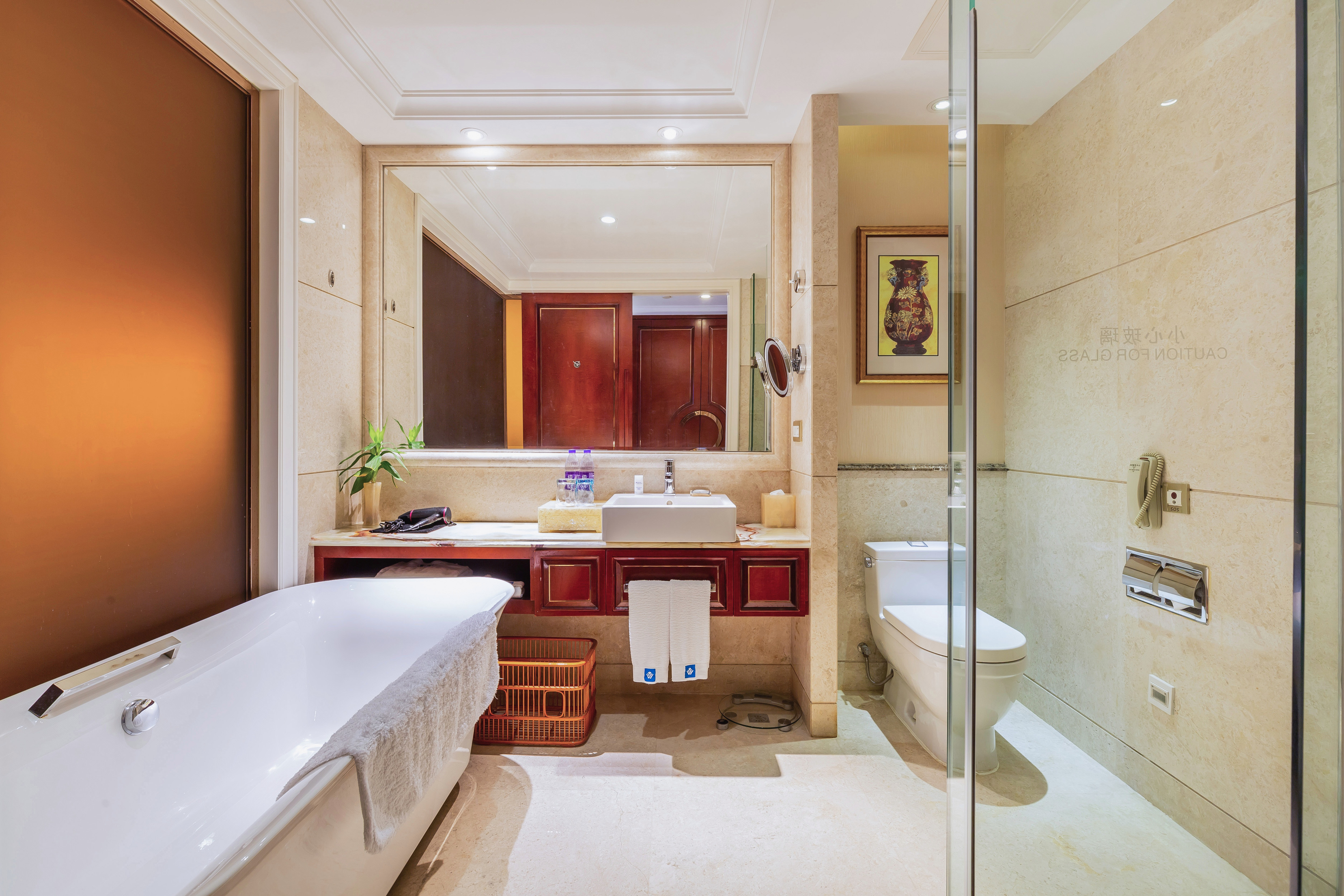 Guest room bath at the Wyndham Foshan Shunde in Foshan, Other than US/Canada