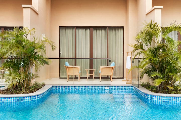 Guest room at the Wyndham Maoming in Maoming, Other than US/Canada