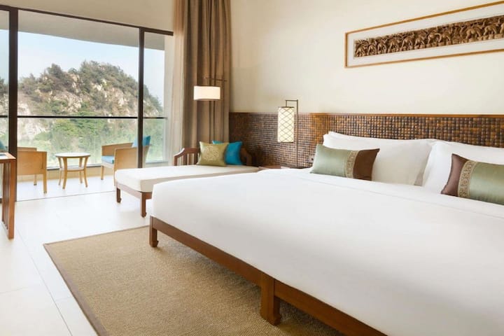 Guest room at the Wyndham Maoming in Maoming, Other than US/Canada