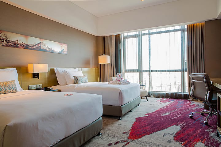 Guest room at the Wyndham Jinjiang in Xishuangbanna Dai Autonomous P, Other than US/Canada