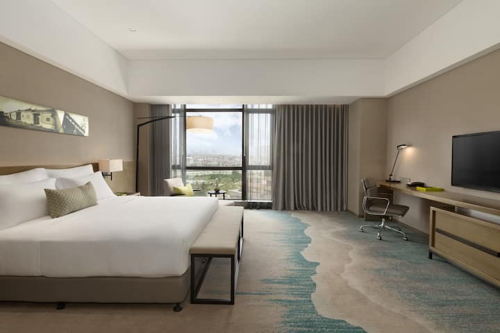 Guest room at the Wyndham Jinjiang in Xishuangbanna Dai Autonomous P, Other than US/Canada