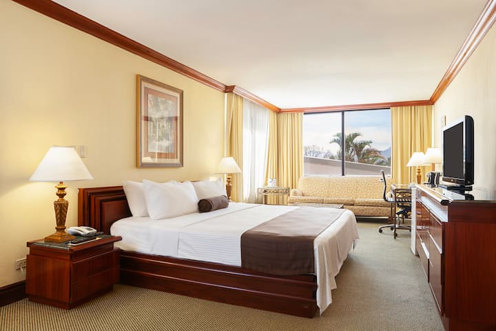 Guest room at the Wyndham San Jose Herradura Hotel & Convention Center in San Jose, Other than US/Canada