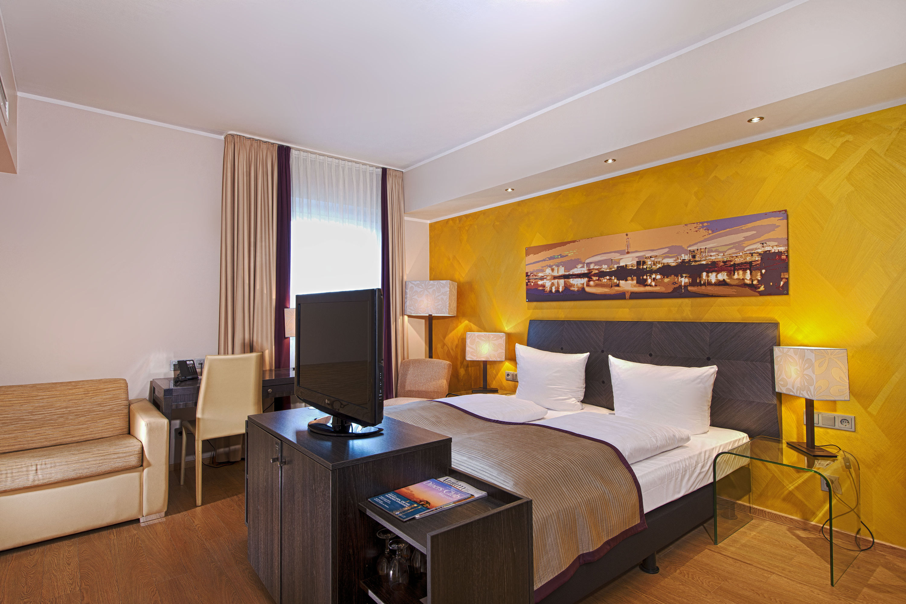 Guest room at the Wyndham Duisburger Hof in Duisburg, Other than US/Canada