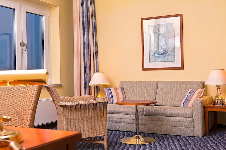 Guest room at the Wyndham Stralsund HanseDom in Stralsund, Other than US/Canada