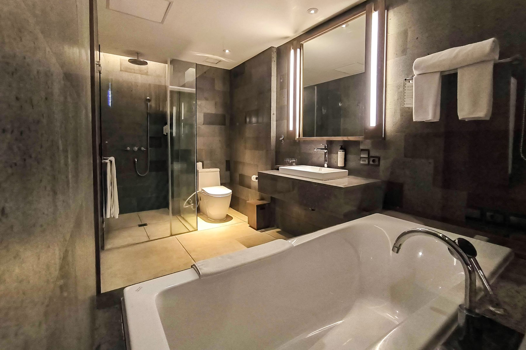 Guest room bath at the Wyndham Tamansari Jivva Resort Bali in Bali, Other than US/Canada