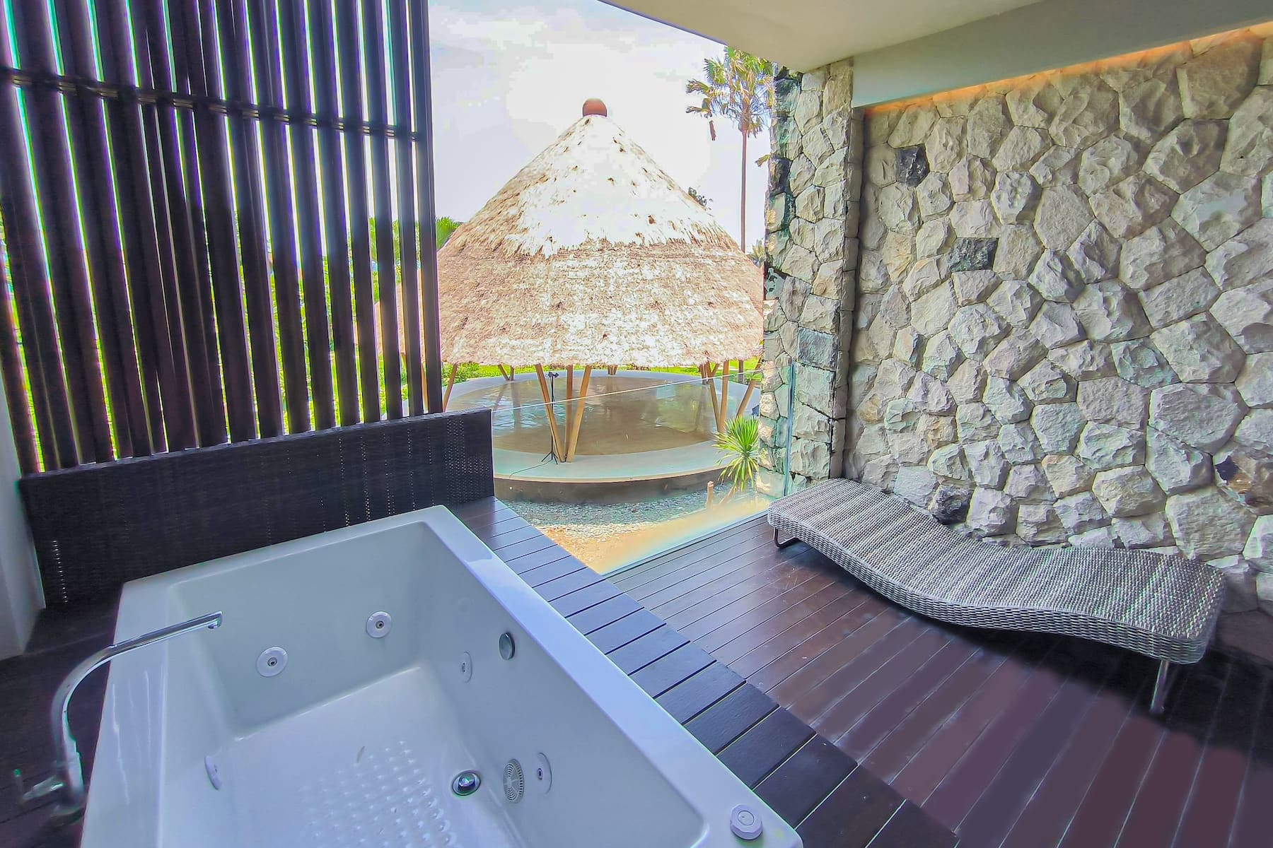 Guest room bath at the Wyndham Tamansari Jivva Resort Bali in Bali, Other than US/Canada