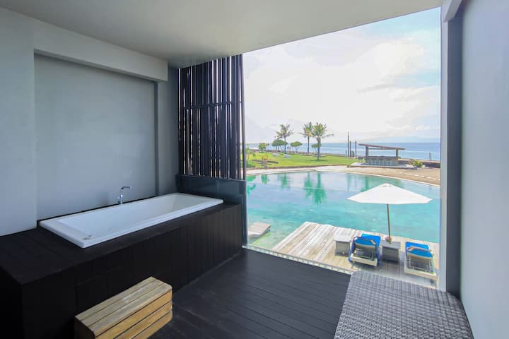 Guest room bath at the Wyndham Tamansari Jivva Resort Bali in Bali, Other than US/Canada
