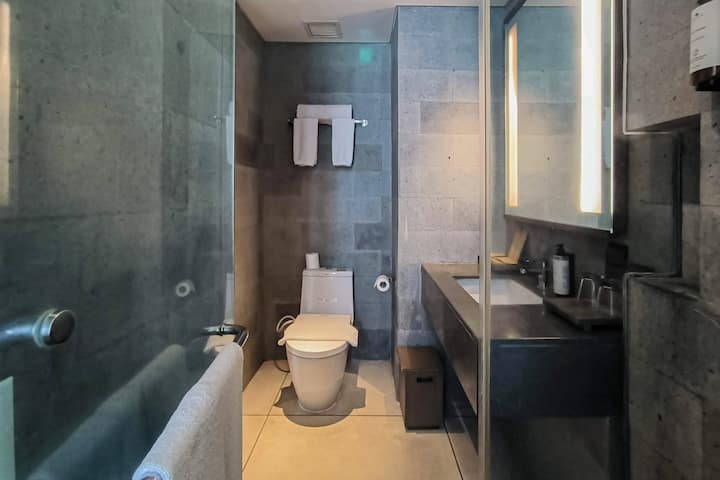 Guest room bath at the Wyndham Tamansari Jivva Resort Bali in Bali, Other than US/Canada