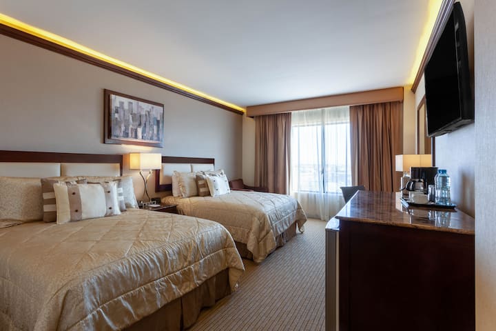 Guest room at the Wyndham Torreon in Torreon, Other than US/Canada