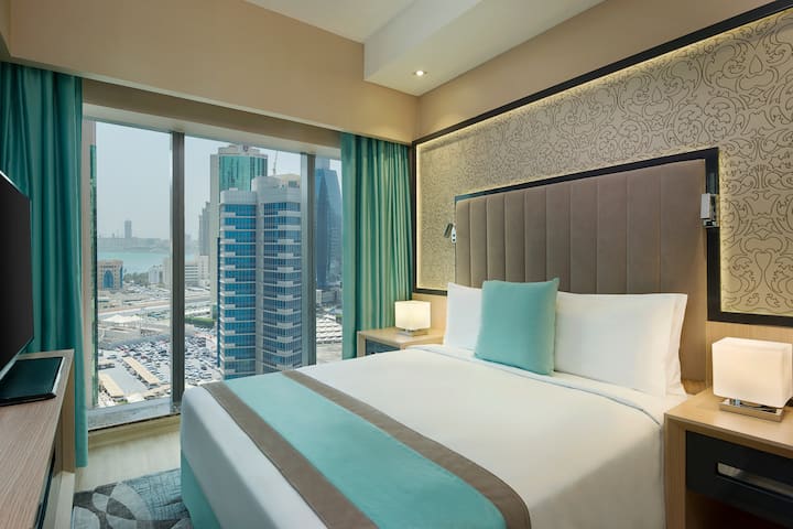 Guest room at the Wyndham Doha West Bay in Doha, Other than US/Canada