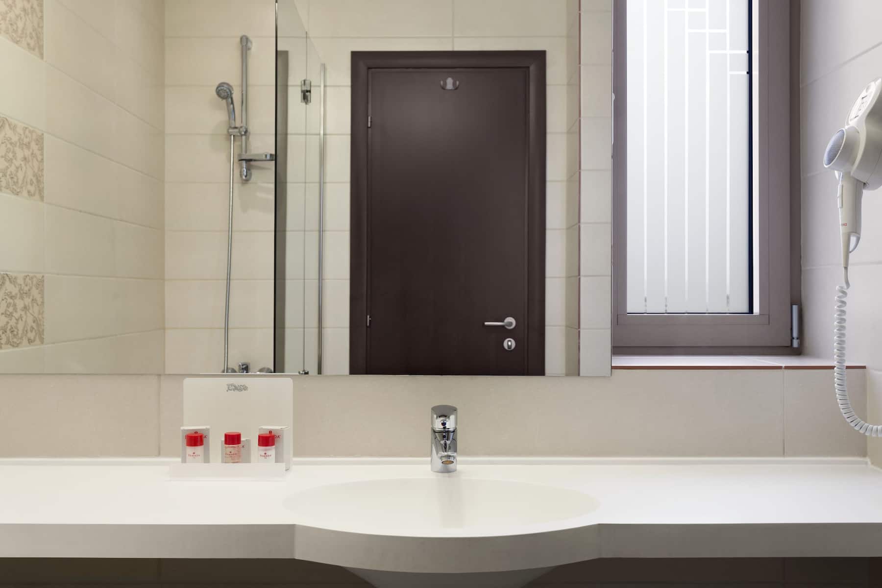 Guest room bath at the Wyndham Cluj in Cluj-Napoca, Other than US/Canada