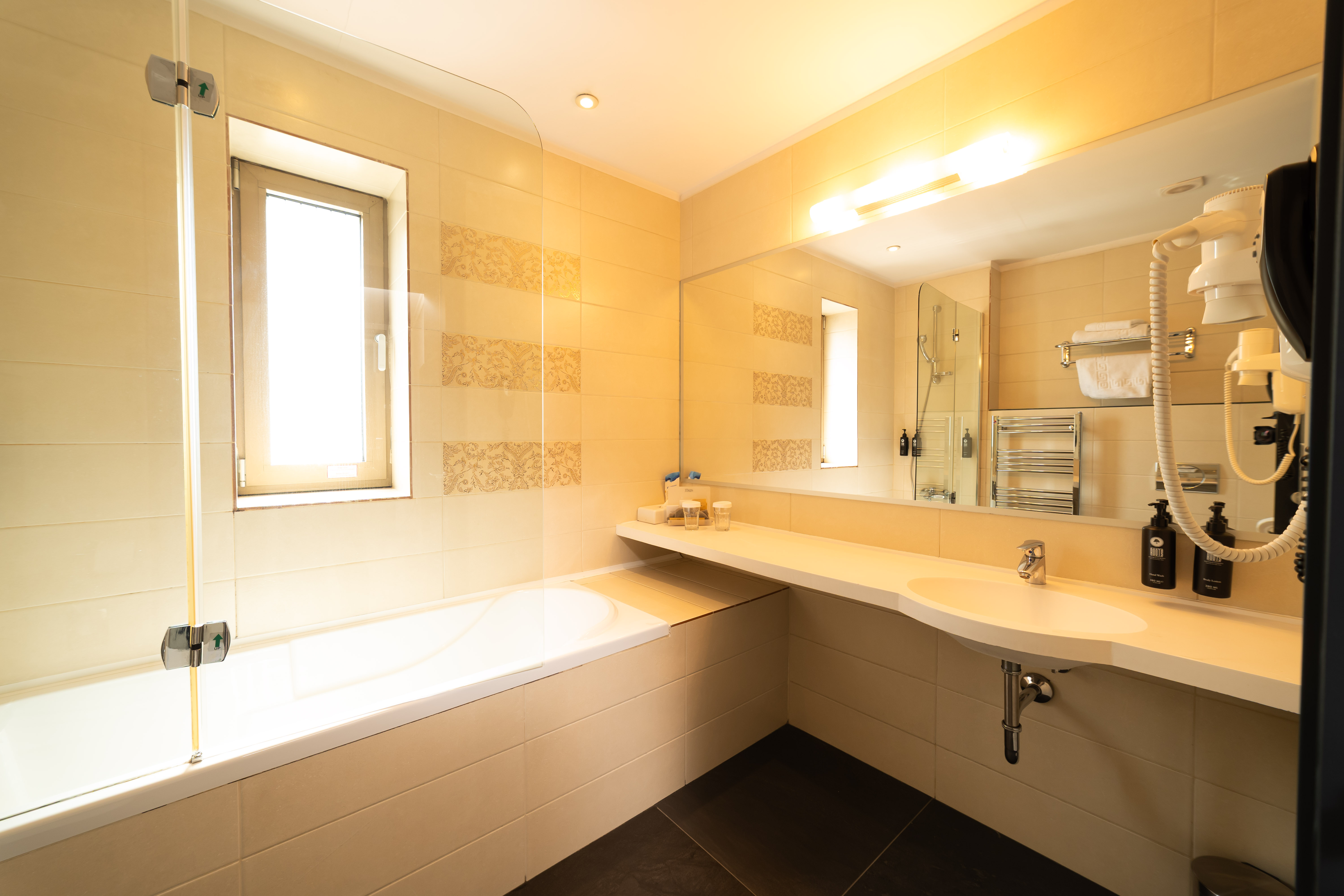 Guest room bath at the Wyndham Cluj in Cluj-Napoca, Other than US/Canada