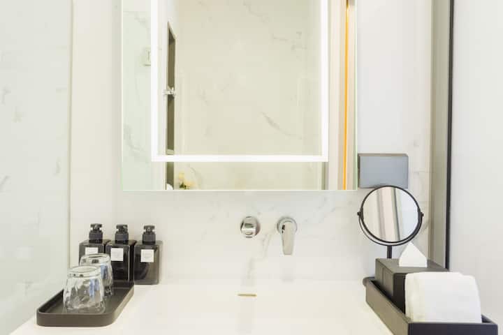 Guest room bath at the Wyndham Bangkok Queen Convention Centre in Bangkok, Other than US/Canada