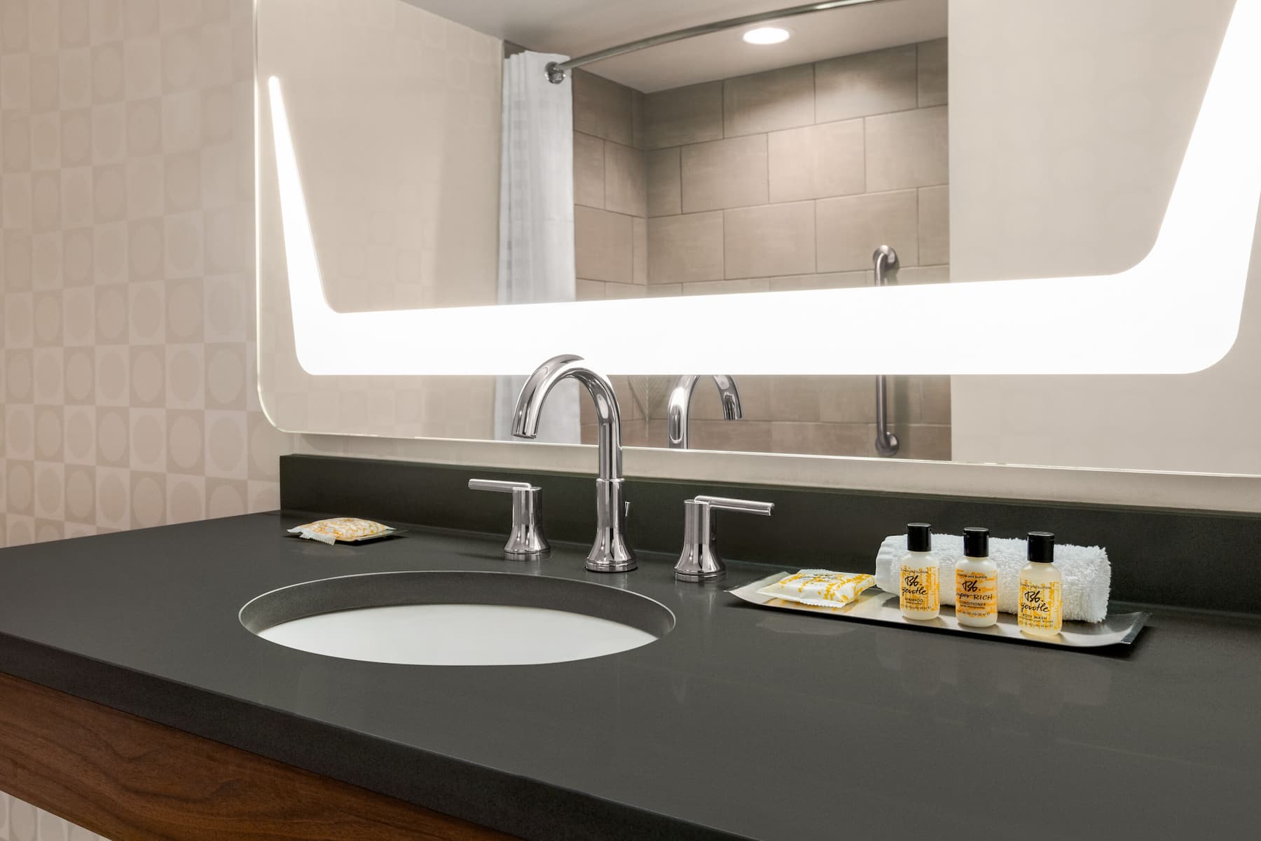 Guest room bath at the Wyndham Fort Smith City Center in Fort Smith, Arkansas