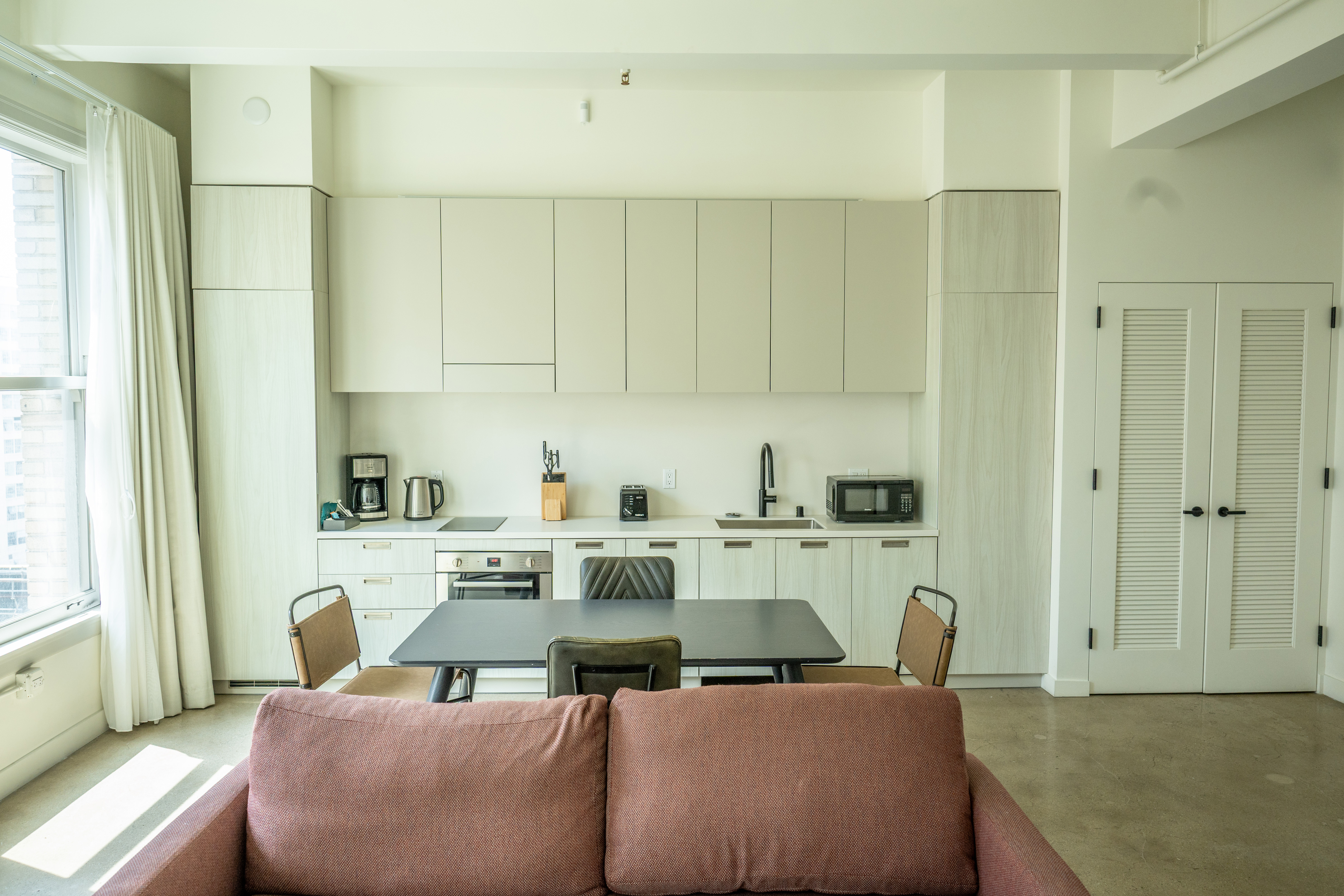 Guest room at the Reside Craftsman Los Angeles, a Wyndham Residence in Los Angeles, California