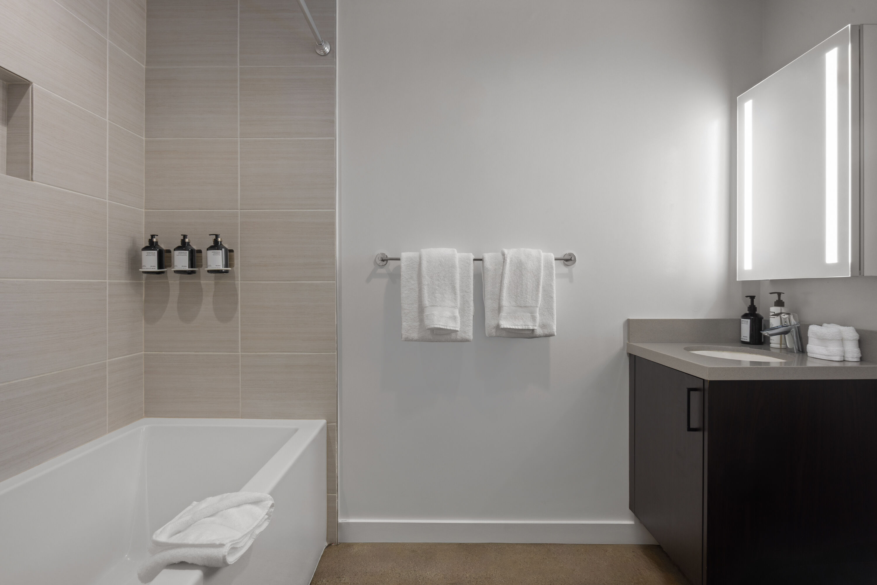 Guest room bath at the The Winfield Lofts, a Wyndham Hotel in Los Angeles, California