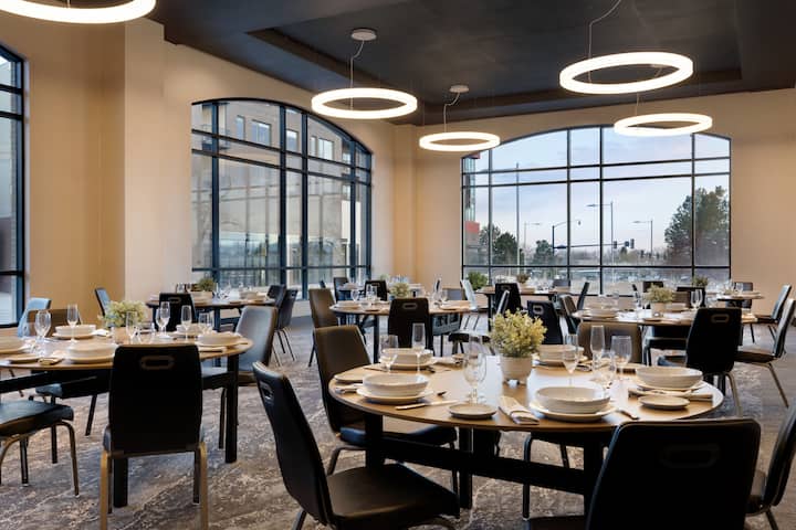 Origin Westminster, a Wyndham Hotel ballroom banquet rounds in Westminster, Colorado