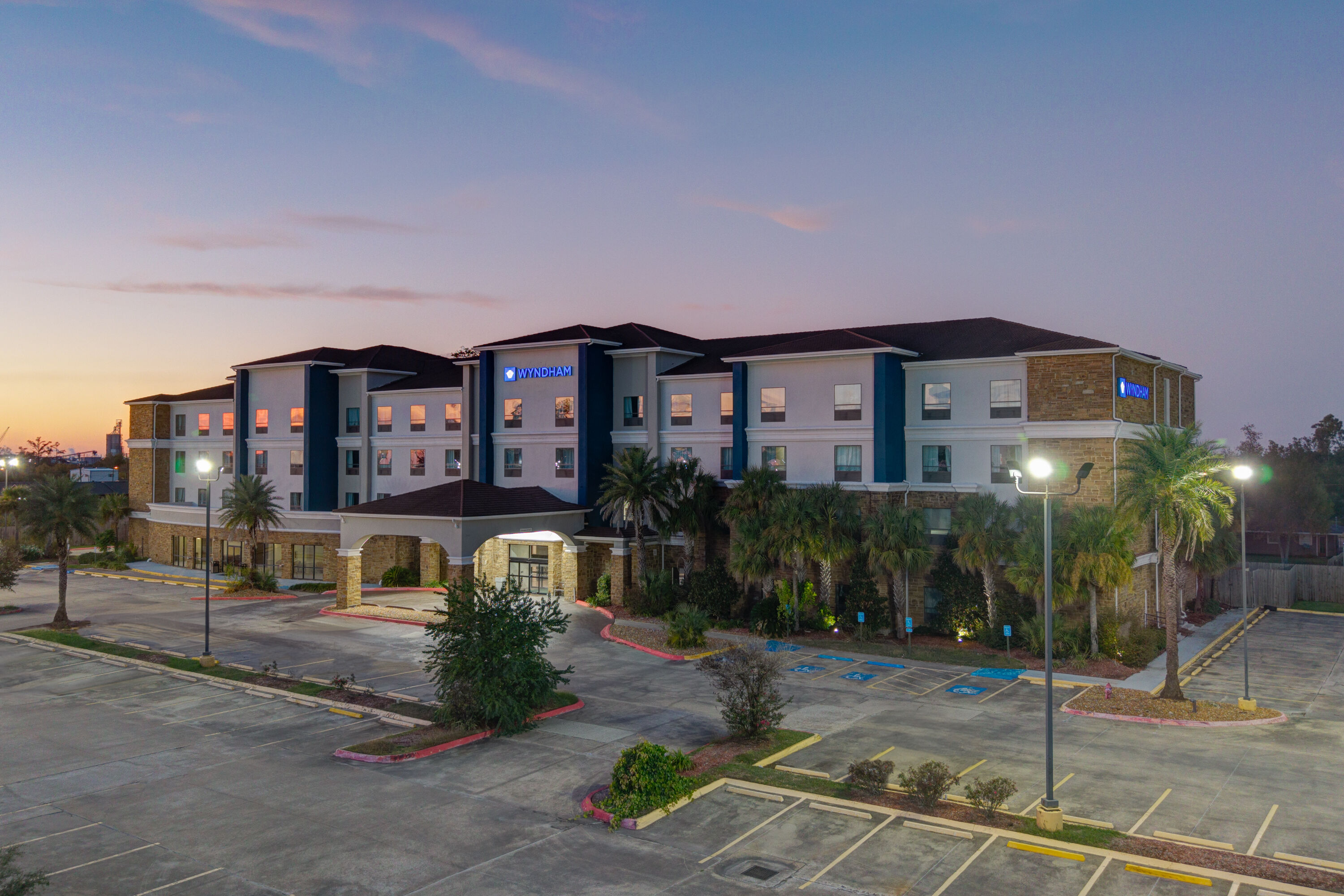 Exterior Dusk Image of Wyndham Lake Charles hotel in Lake Charles, Louisiana