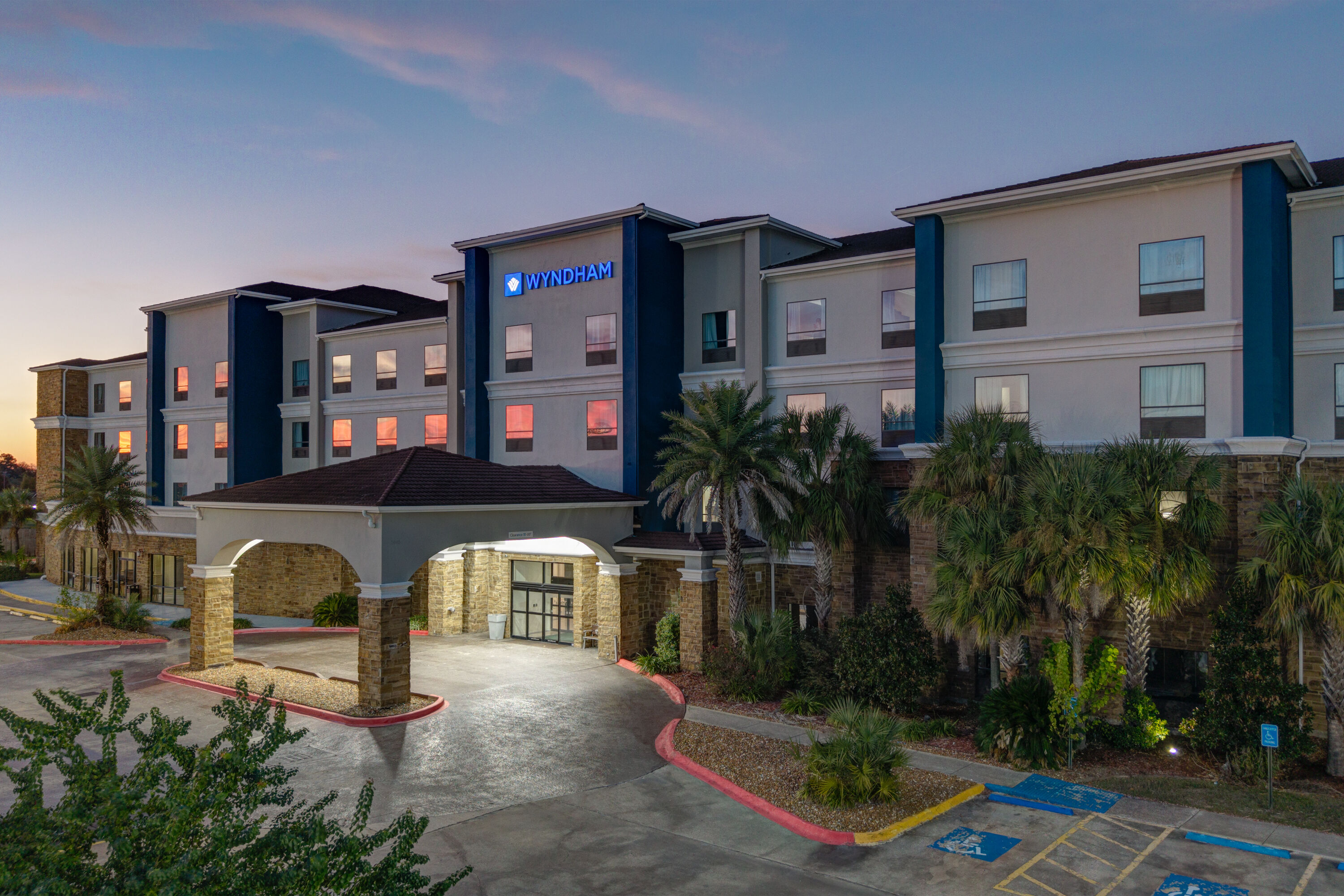 Exterior Dusk Image of Wyndham Lake Charles hotel in Lake Charles, Louisiana
