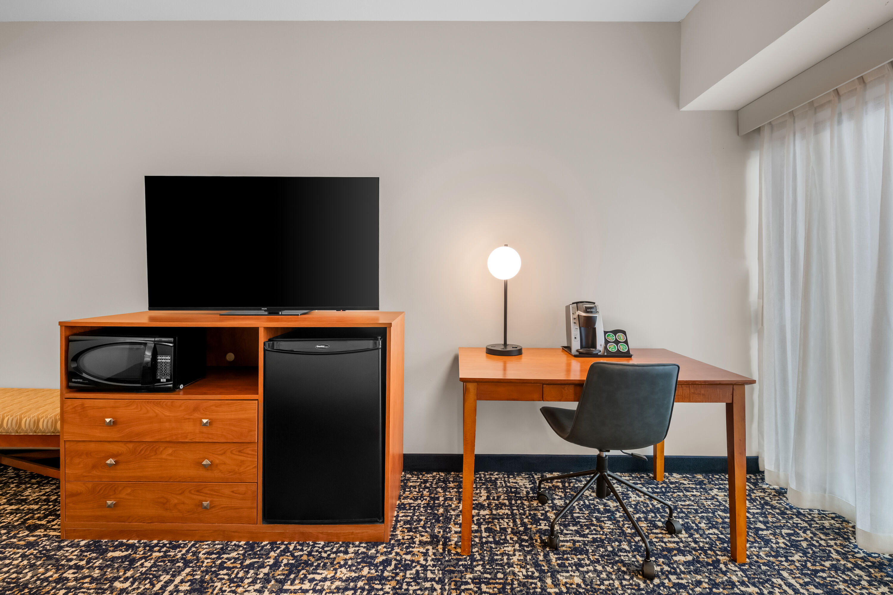 King bed guest room at the Wyndham Bloomington - Mall of America in Bloomington, Minnesota