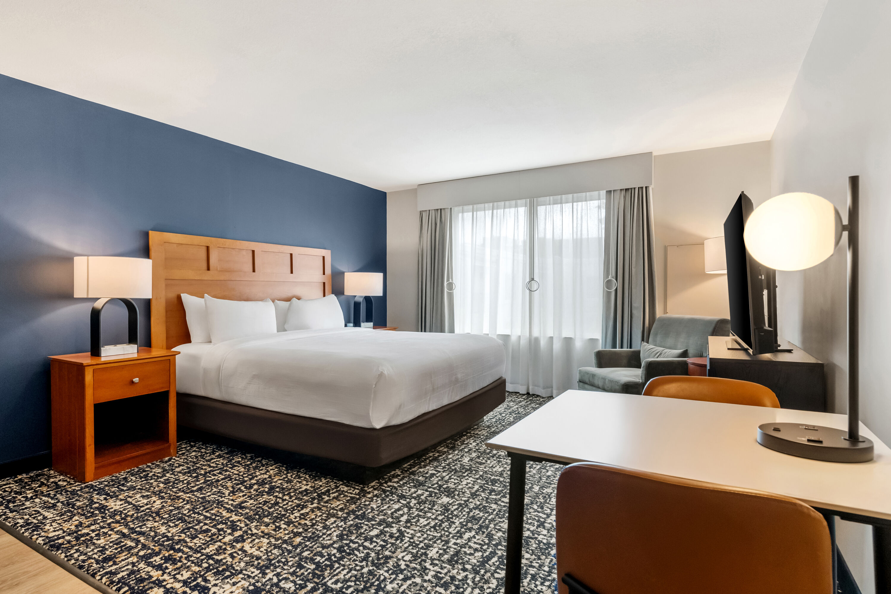 King bed guest room at the Wyndham Bloomington - Mall of America in Bloomington, Minnesota