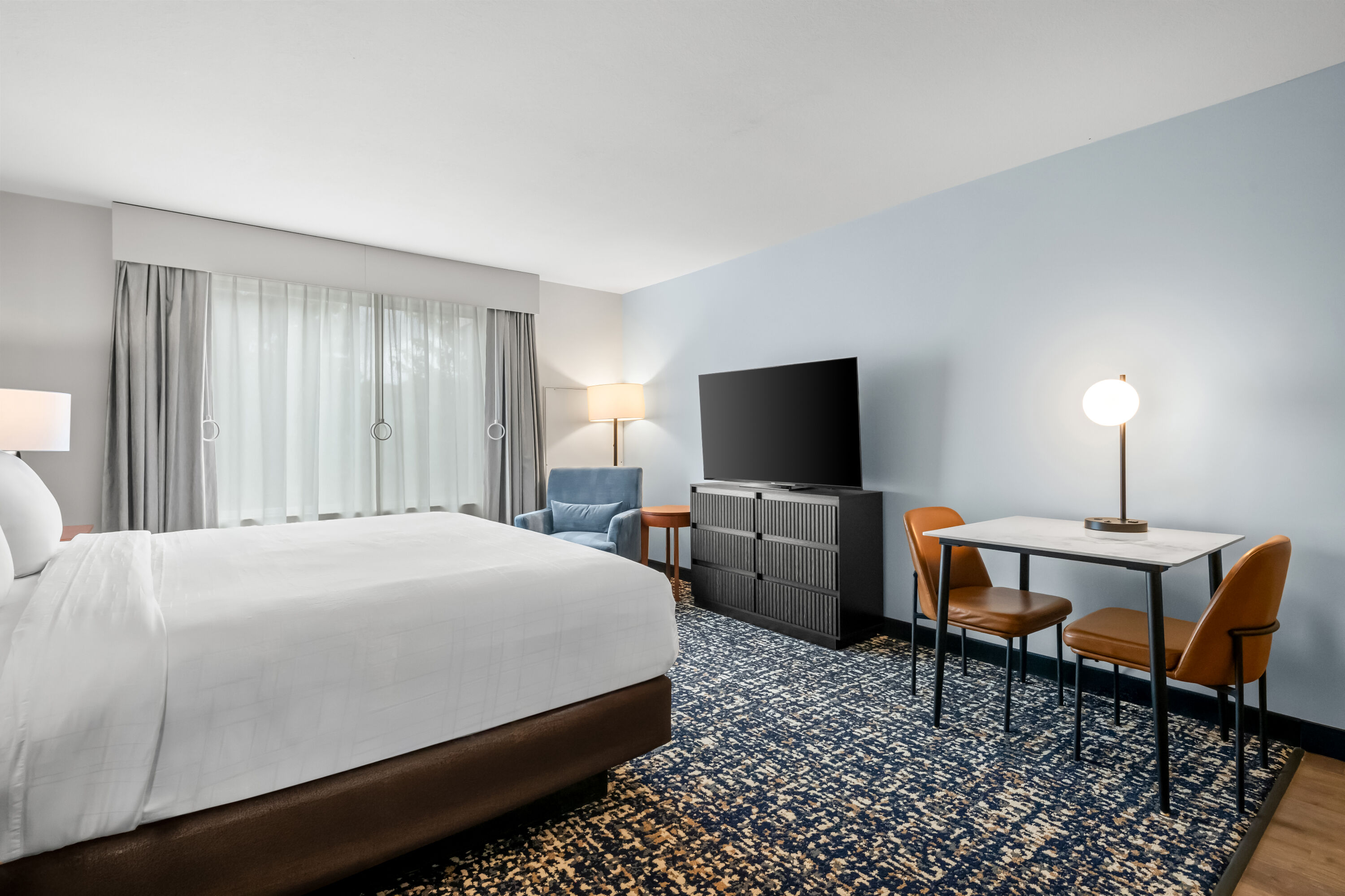 King bed guest room at the Wyndham Bloomington - Mall of America in Bloomington, Minnesota