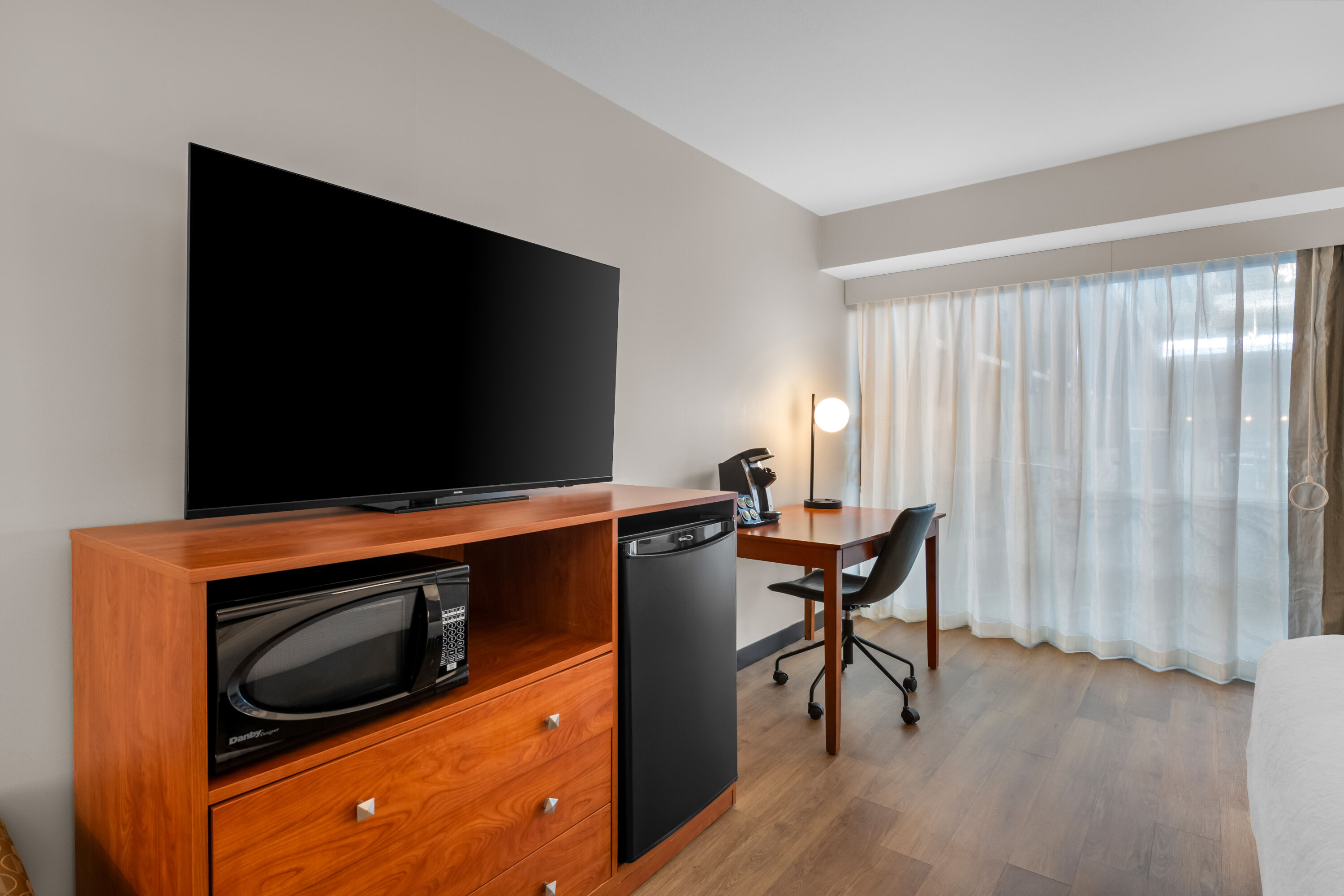 King bed guest room at the Wyndham Bloomington - Mall of America in Bloomington, Minnesota