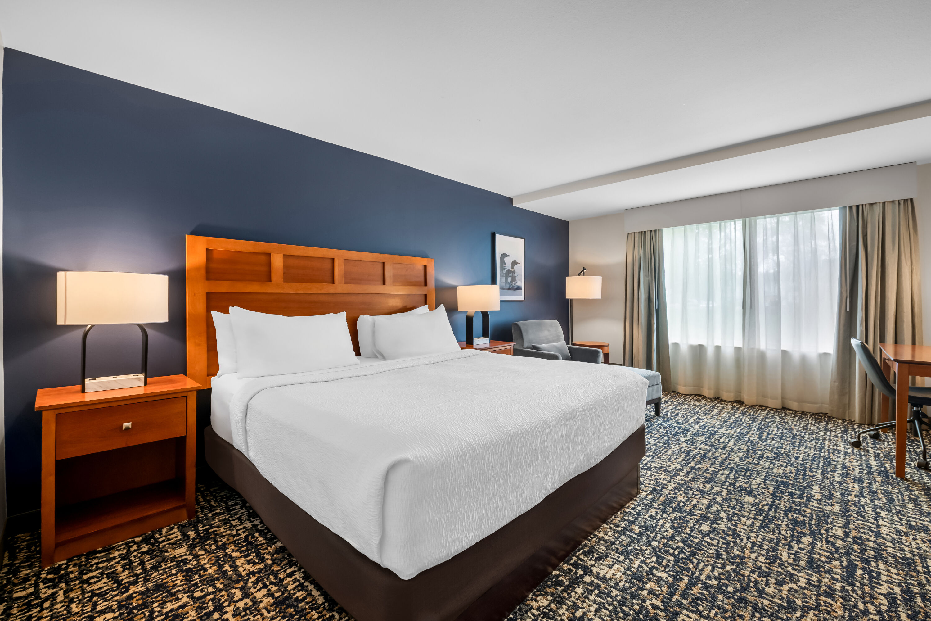 King bed guest room at the Wyndham Bloomington - Mall of America in Bloomington, Minnesota