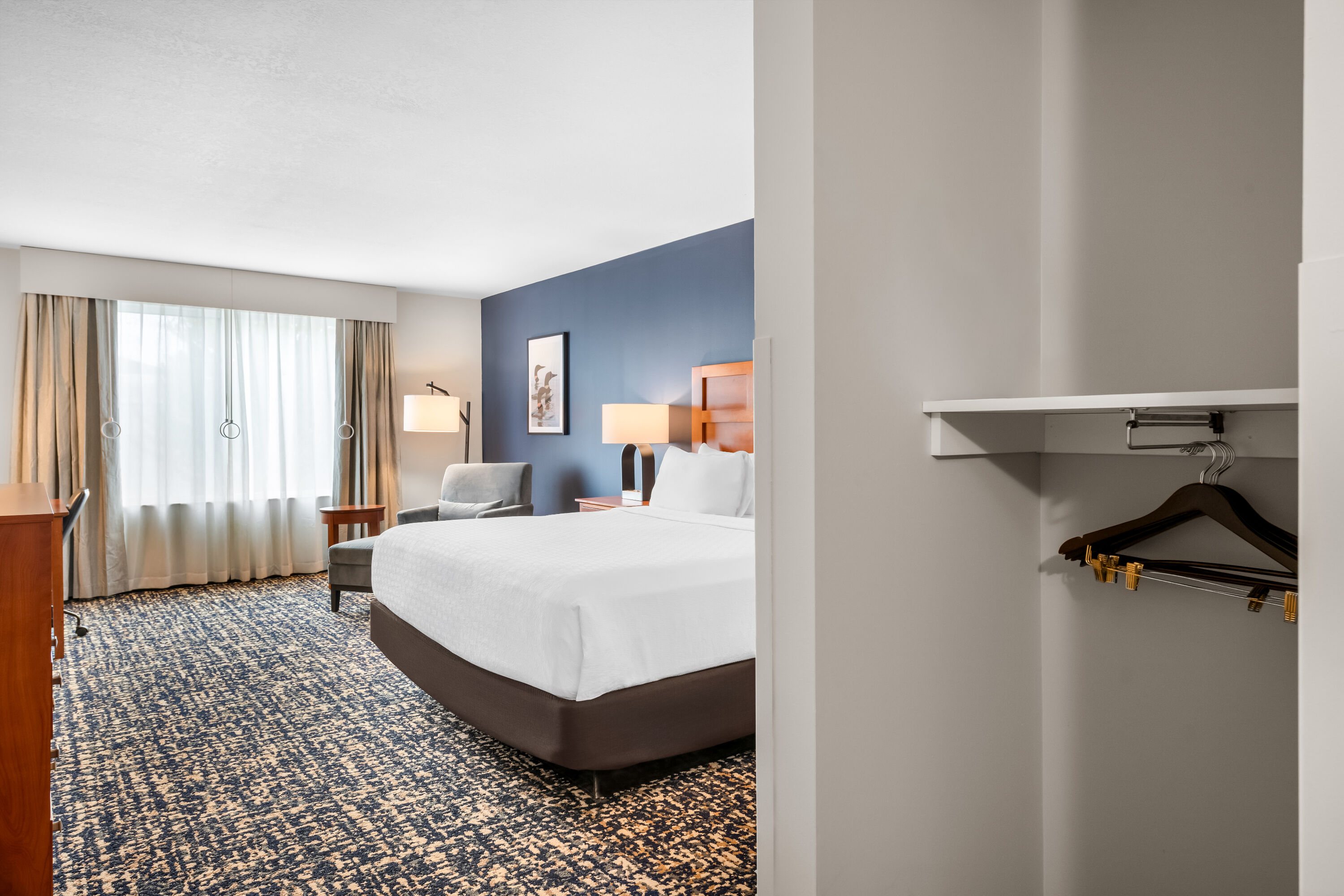 King bed guest room at the Wyndham Bloomington - Mall of America in Bloomington, Minnesota
