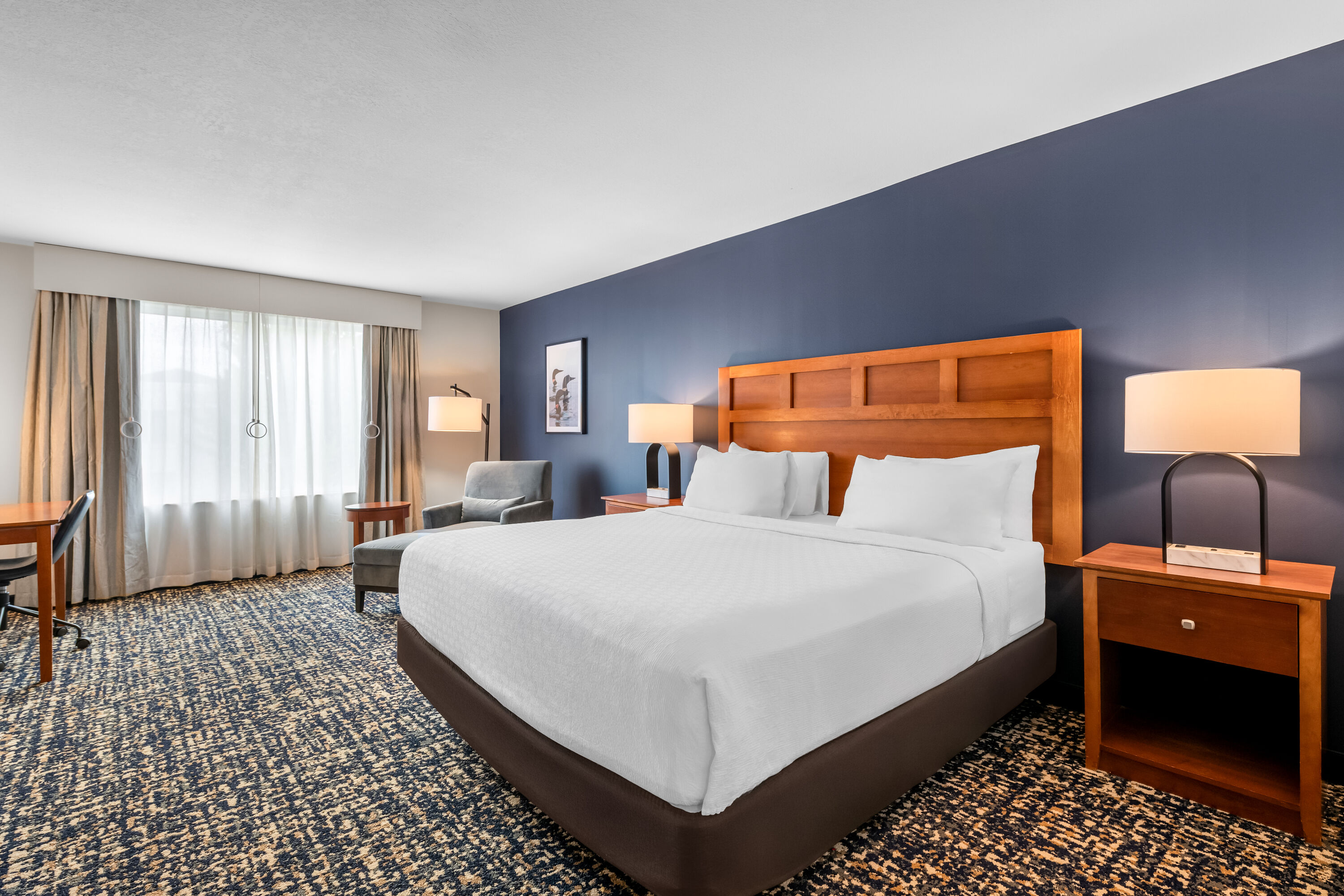 King bed guest room at the Wyndham Bloomington - Mall of America in Bloomington, Minnesota