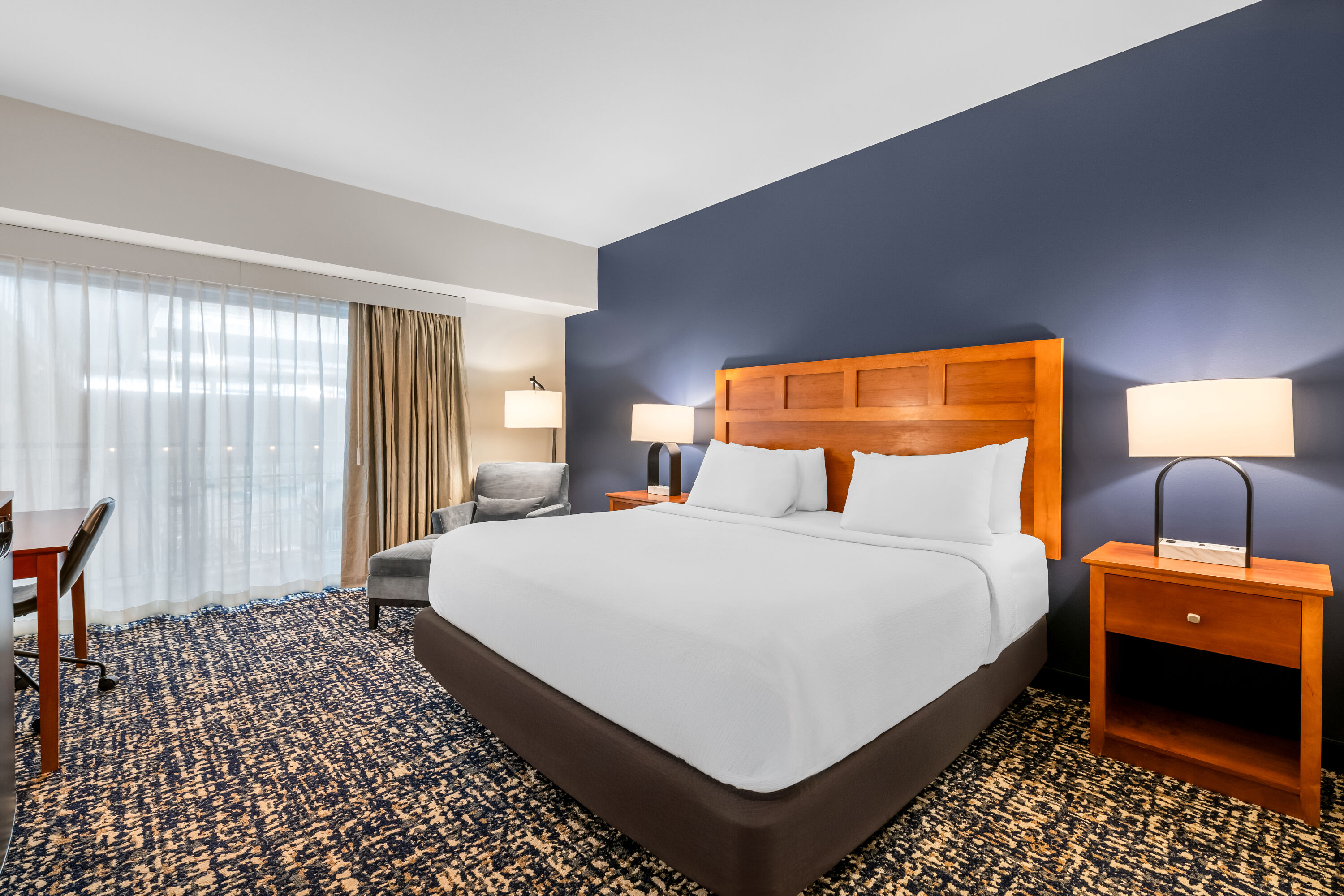 King bed guest room at the Wyndham Bloomington - Mall of America in Bloomington, Minnesota