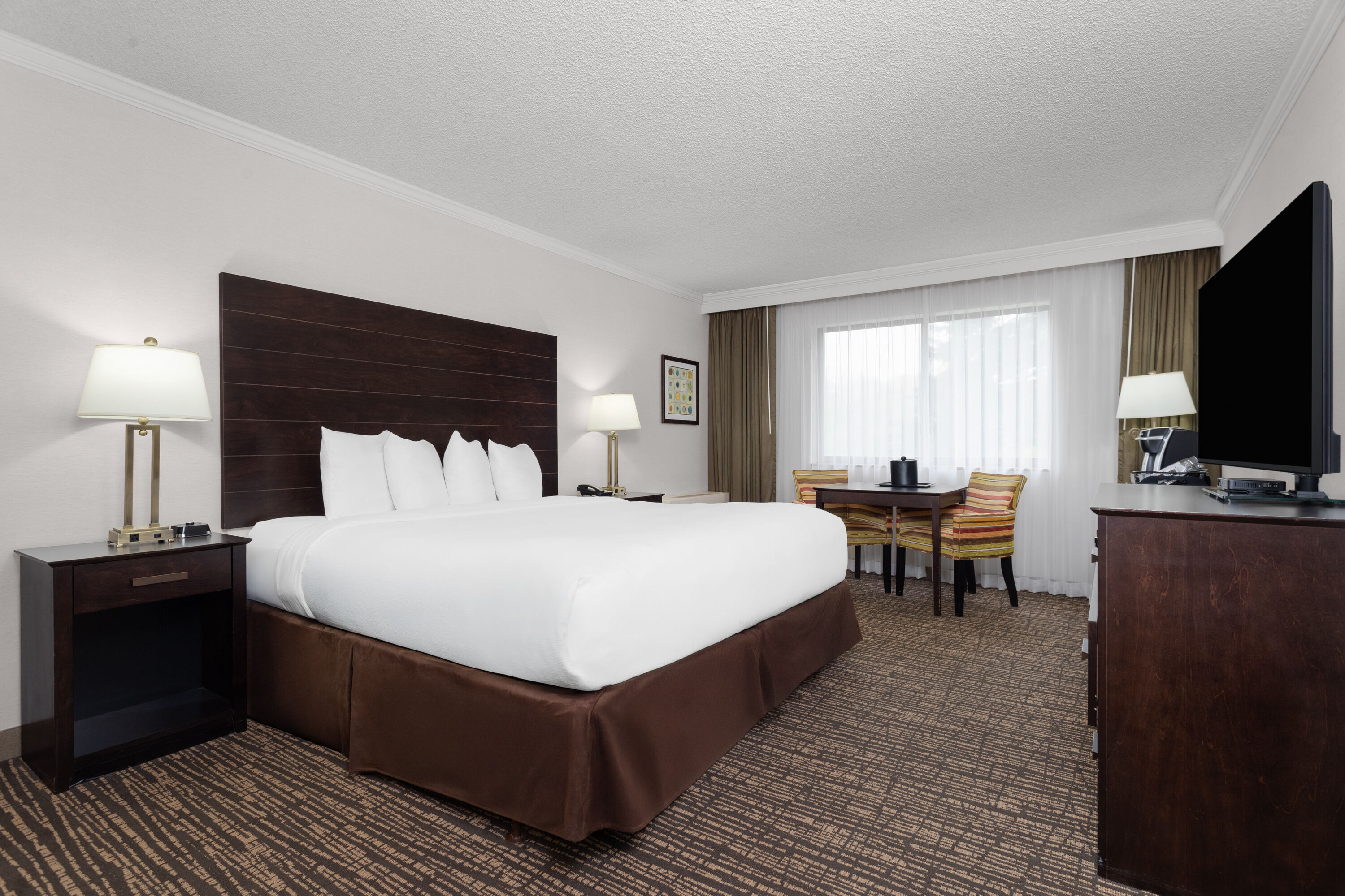 Guest room at the Wyndham Minneapolis South/Burnsville in Burnsville, Minnesota