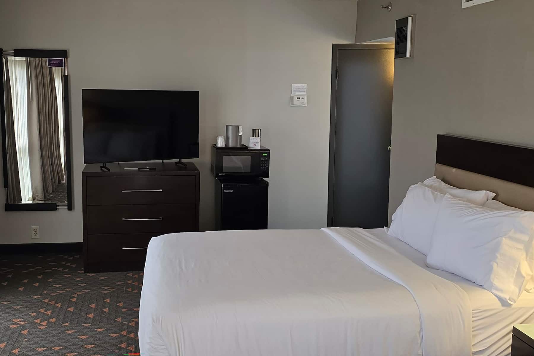 Guest room at the Wyndham Rochester Downtown in Rochester, New York