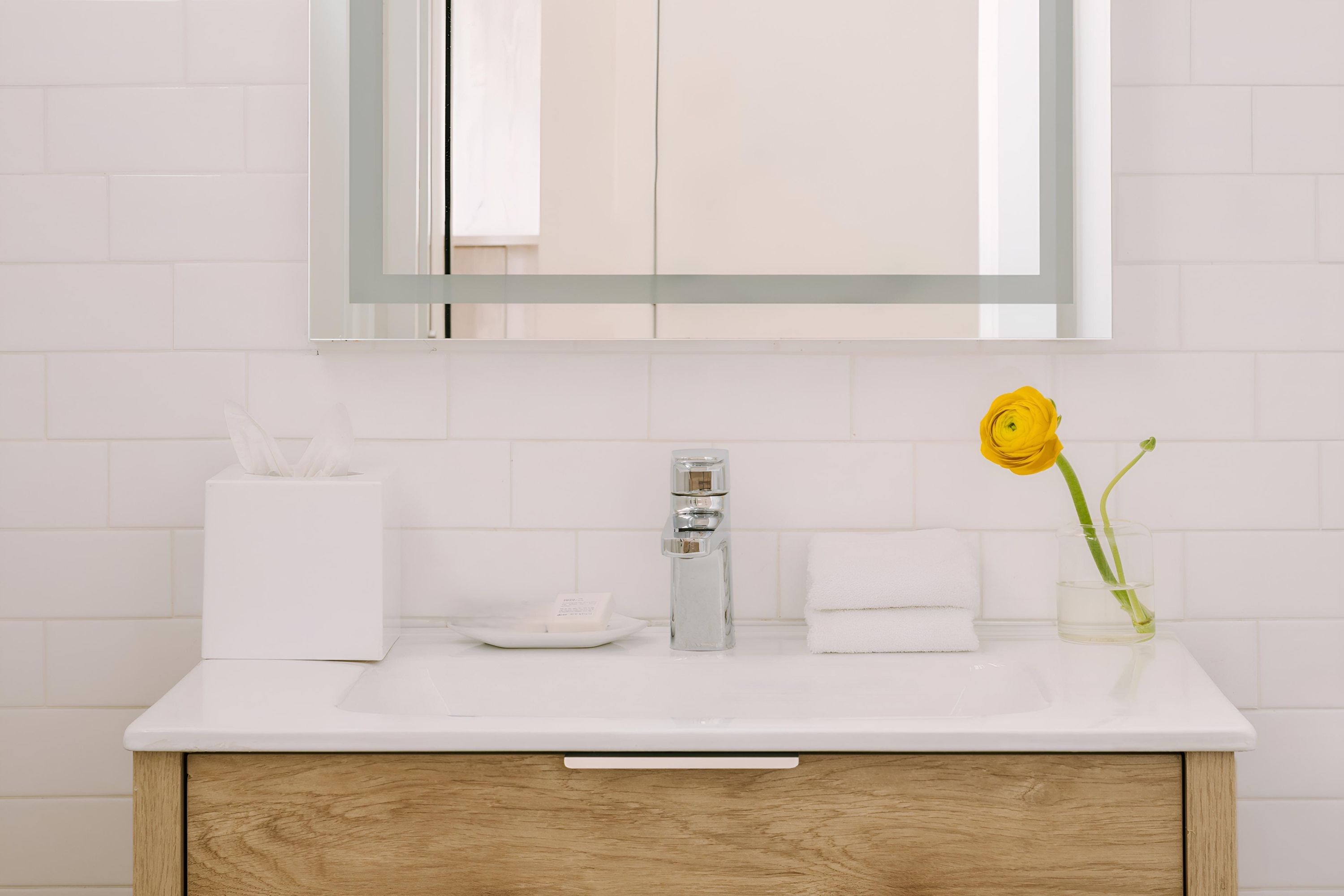 Guest room bath at the The Heid Lofts by Reside, a Wyndham Residence in Philadelphia, Pennsylvania