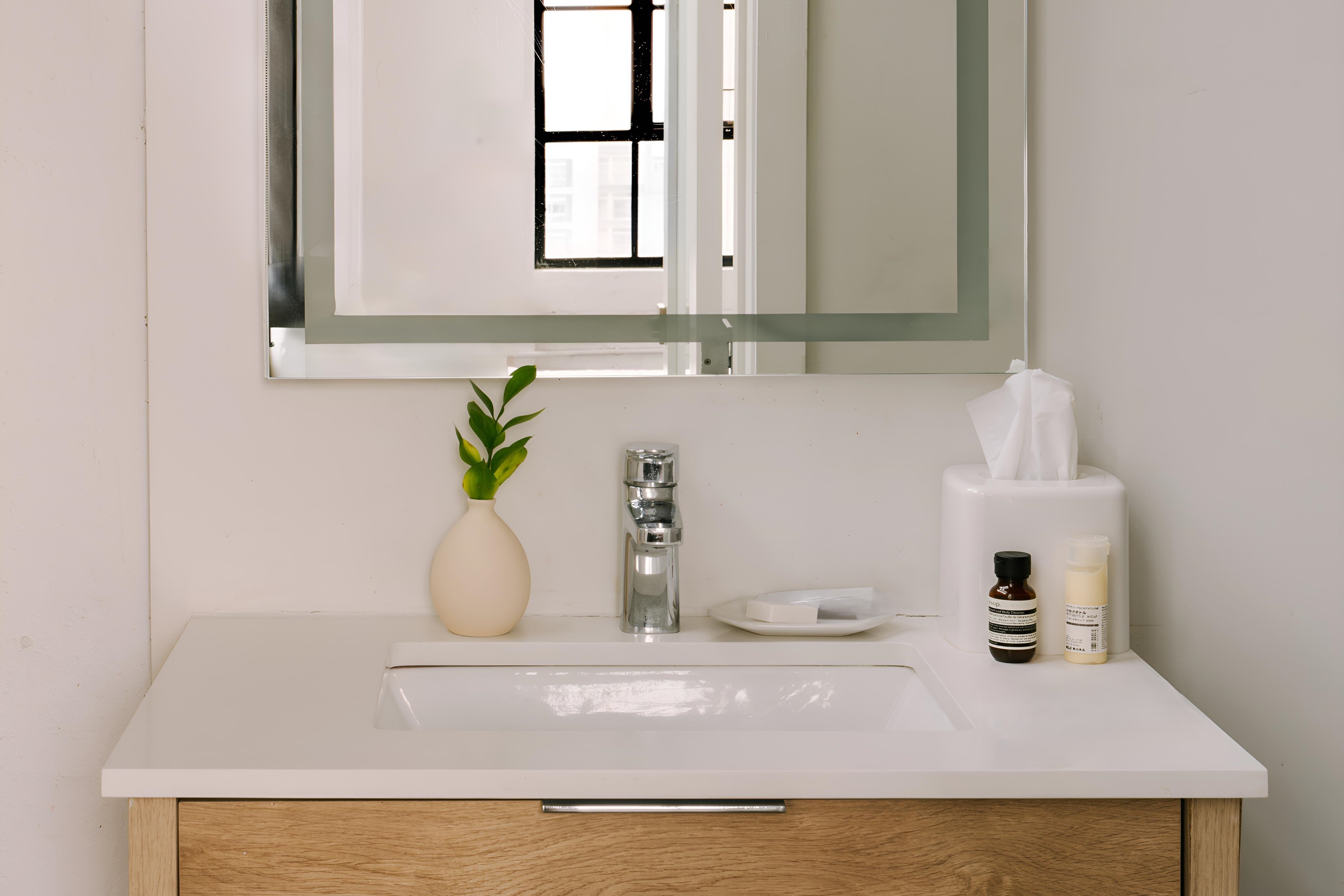 Guest room bath at the The Heid Lofts by Reside, a Wyndham Residence in Philadelphia, Pennsylvania