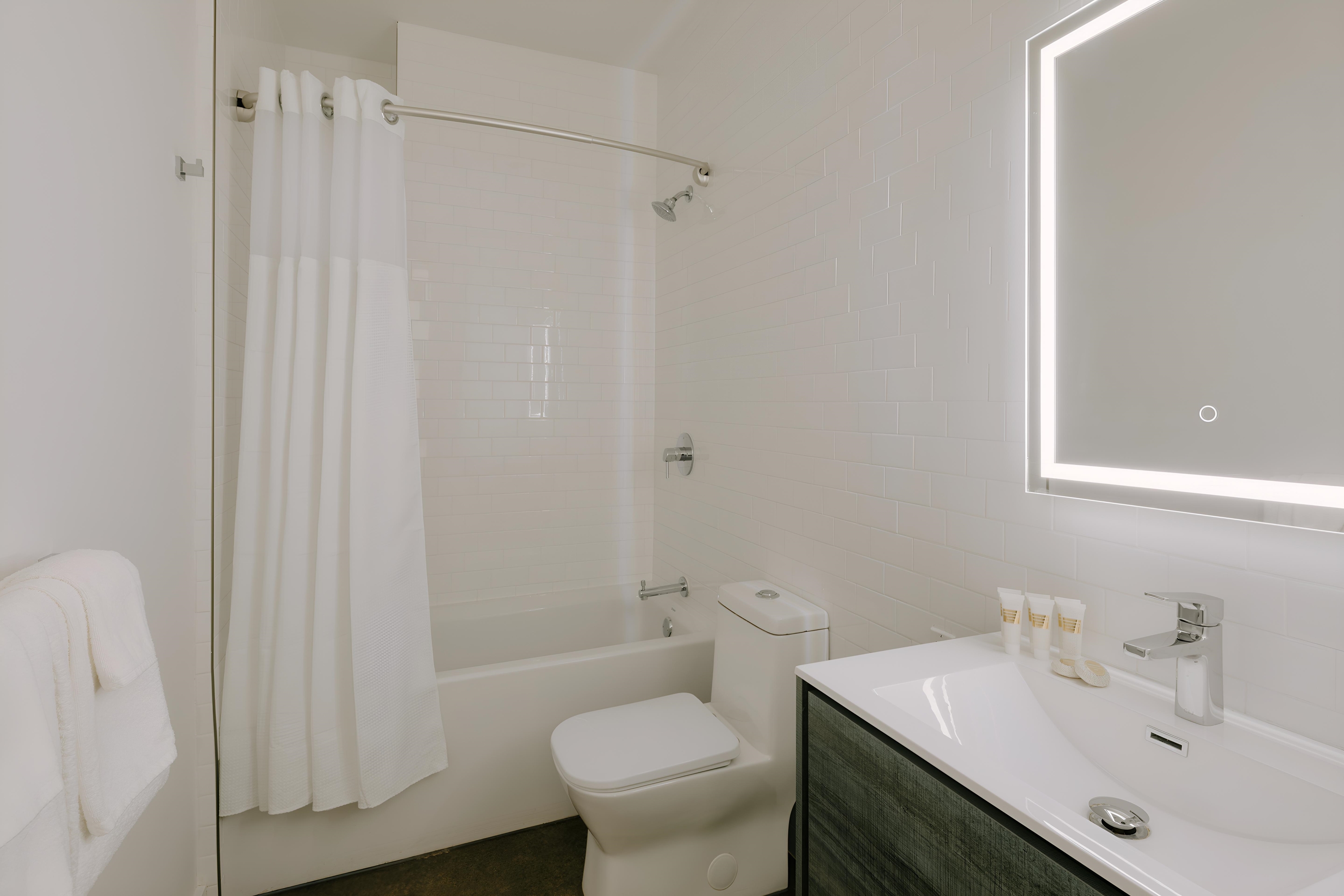 Guest room bath at the The Heid Lofts by Reside, a Wyndham Residence in Philadelphia, Pennsylvania
