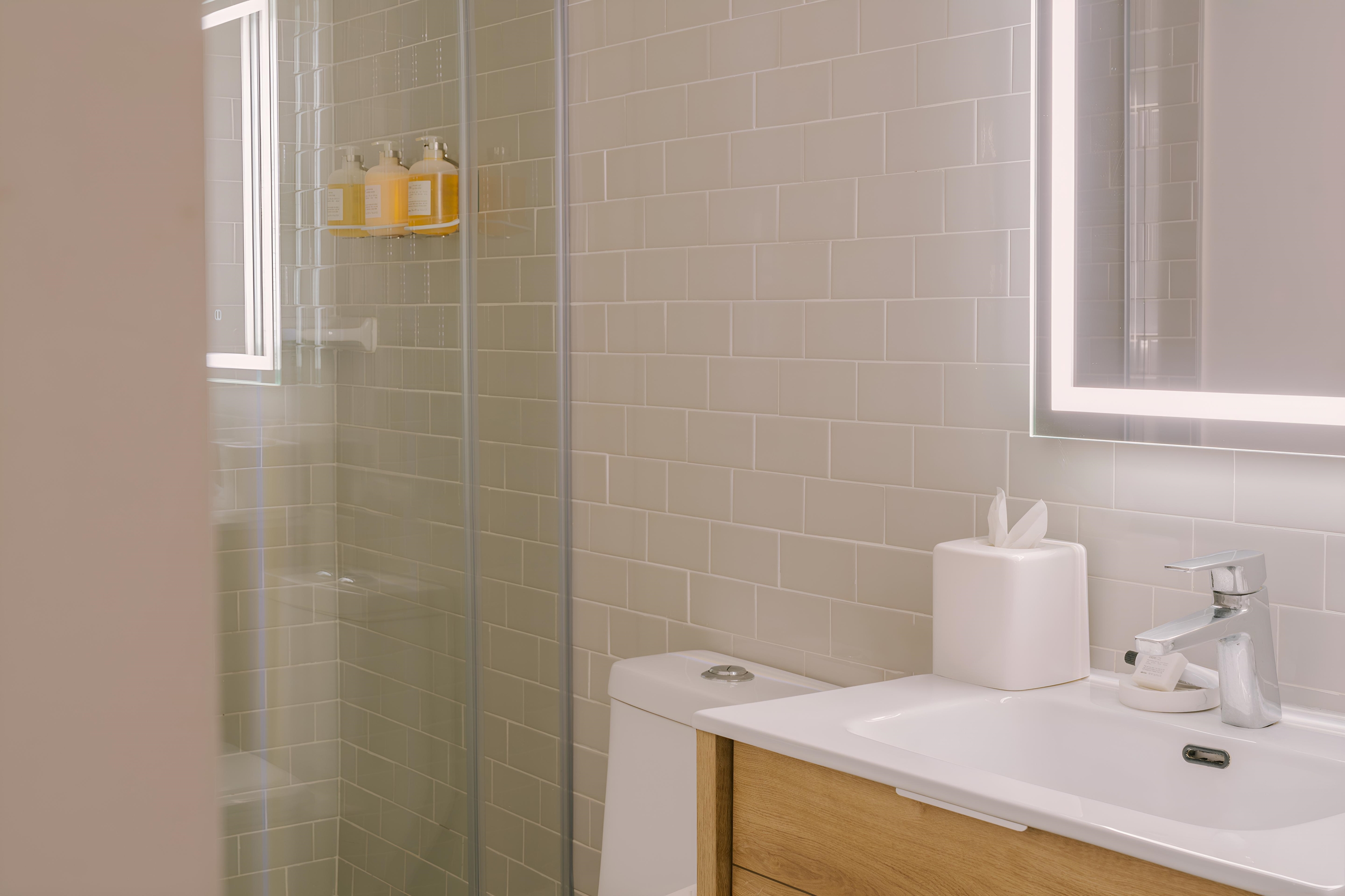 Guest room bath at the The Heid Lofts by Reside, a Wyndham Residence in Philadelphia, Pennsylvania