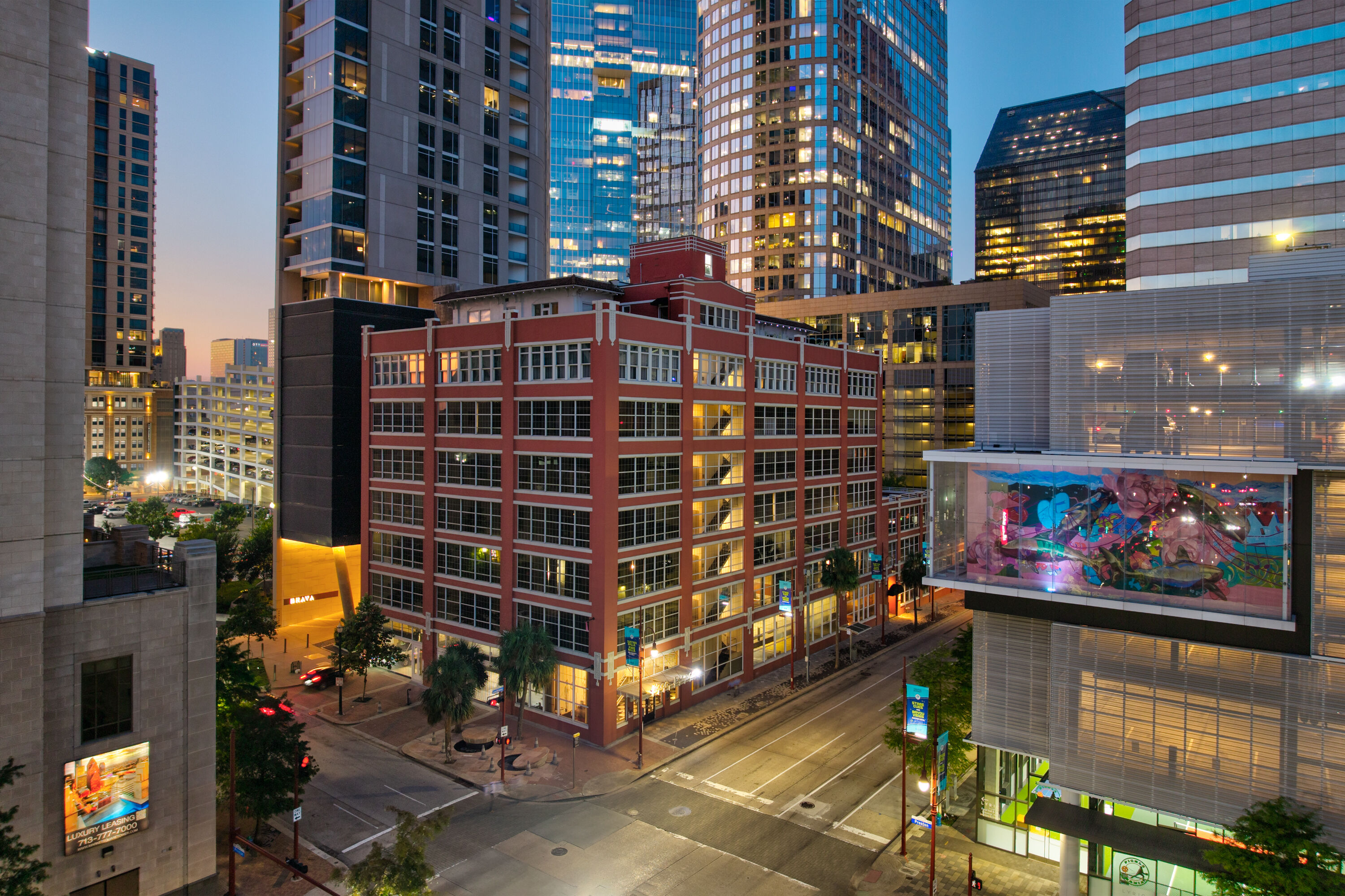Exterior Dusk Image of Reside Houston Downtown, a Wyndham Residence hotel in Houston, Texas
