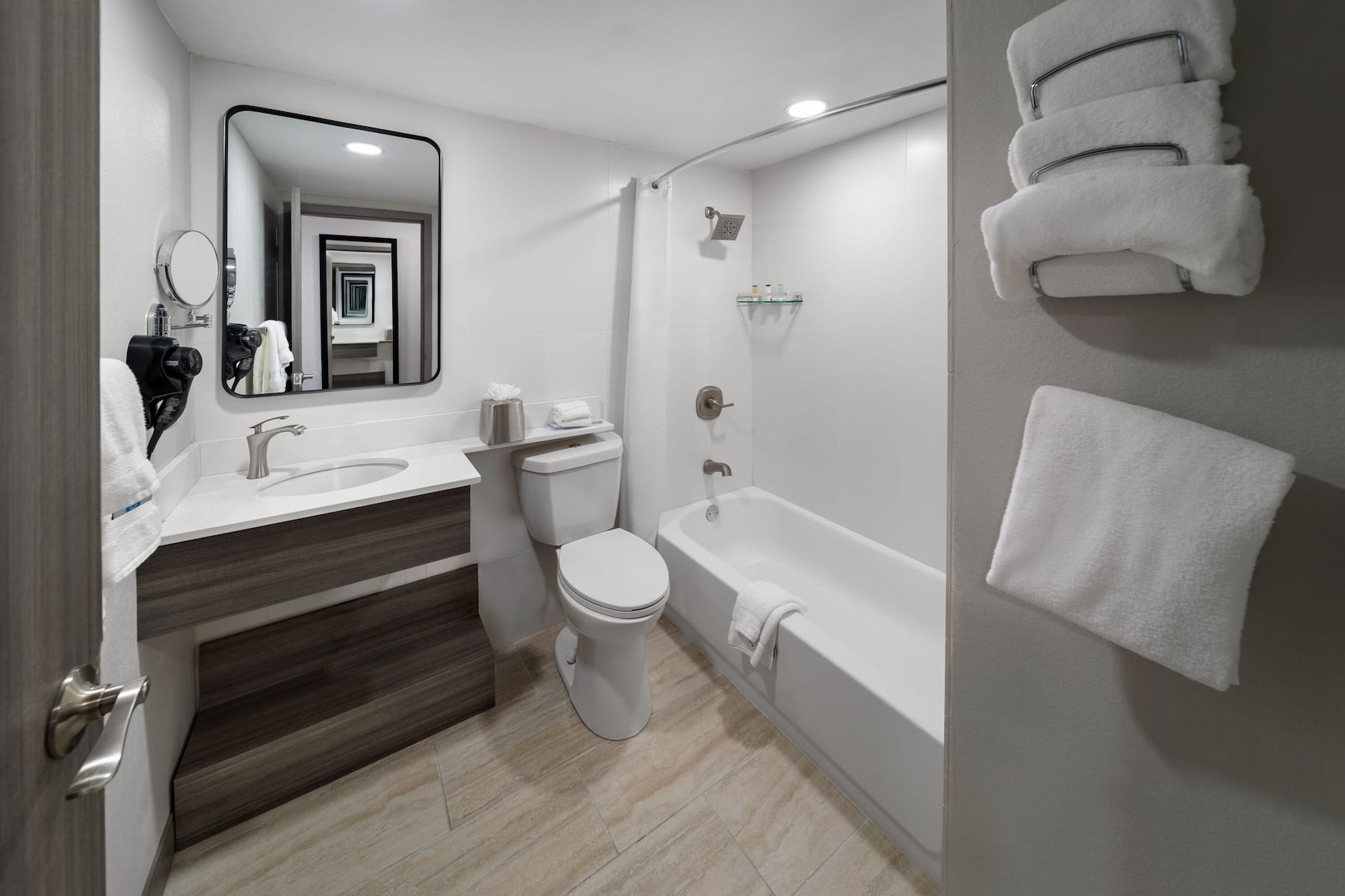 Guest room bath at the Wyndham DFW Airport in Irving, Texas