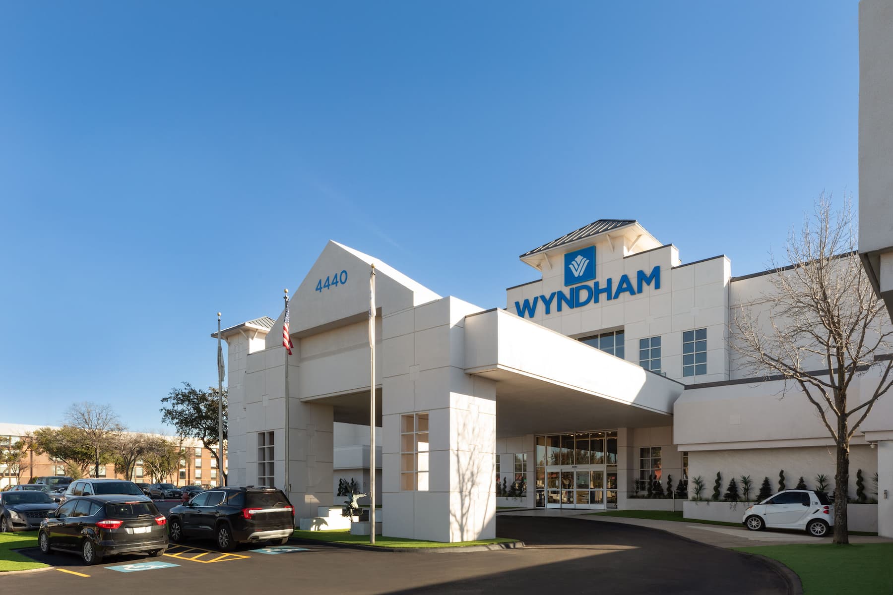 Exterior Day Image of Wyndham DFW Airport hotel in Irving, Texas